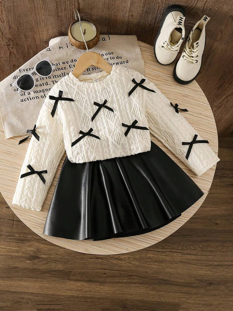 SHEIN LMoss Kids LMoss Young Girl Casual Sweater With Bow Decoration&Woven Solid Color PU Leather Casual Skirt Set,Suitable For Everyday Wear | SHEIN