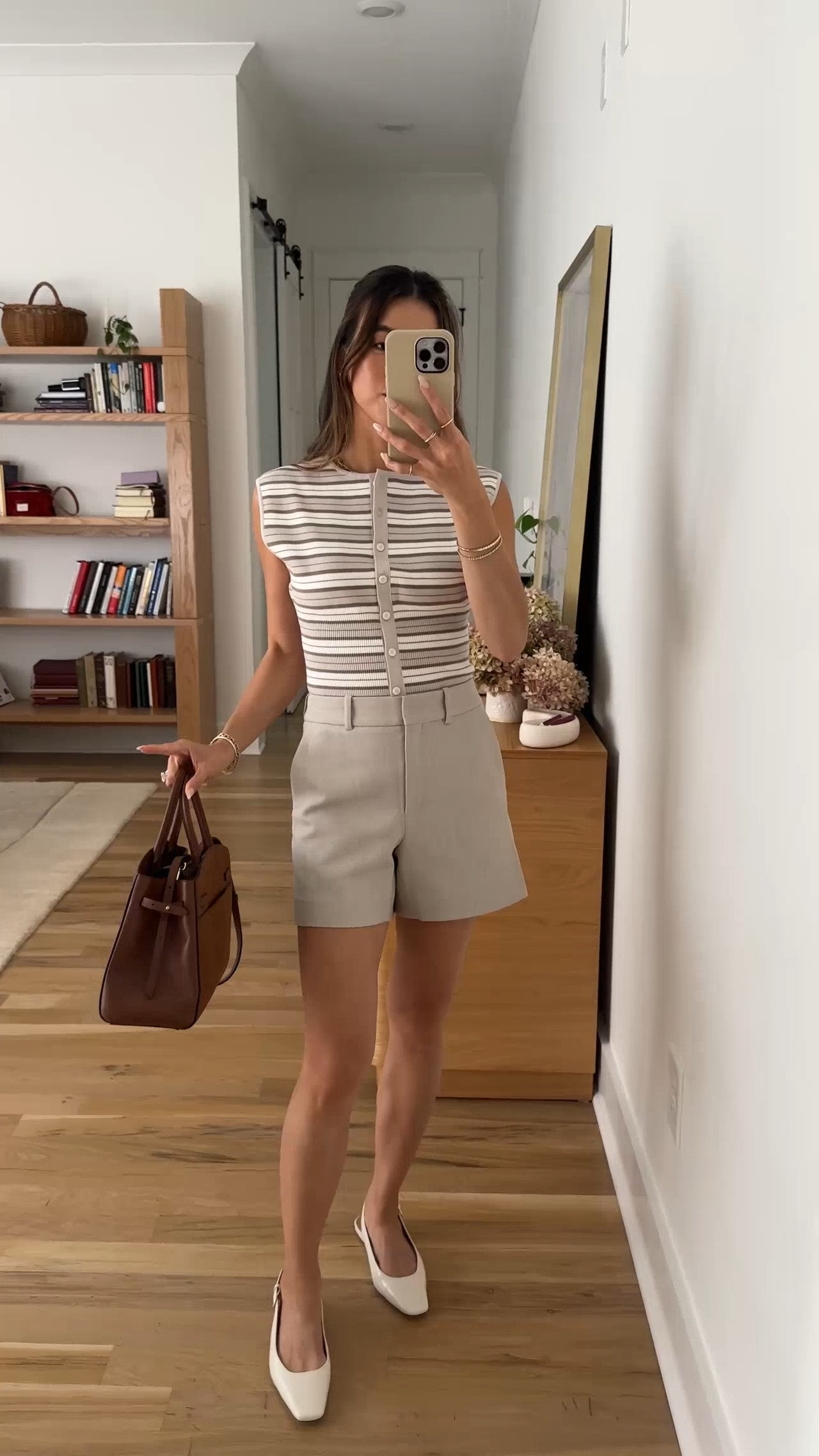 Are you looking for petite friendly tailored shorts? This @Aritzia pair are so cute and fit amazing!

Sizing info:
 • Aritzia New Agency Mid-Thigh Short (Size 0 in Heather Matte Pearl) 
• Aritzia Golightly Sleeveless Cardigan (XS ) 

Aritzia best sellers, best pieces from Aritzia for petite, Aritzia shorts for petite, what shorts from Aritzia will fit if youre petite, Petite style guide, how to dress if you’re petite, Petite style, petite fashion, mom outfit, mom style, petite shorts, petite outfit ideas, petite outfits, best shorts for petite, petite tailored shorts, spring style, spring outfits, spring break, vacation outfits, Aritzia try on, summer shorts,

#LTKootd #LTKSeasonal #LTKPetite