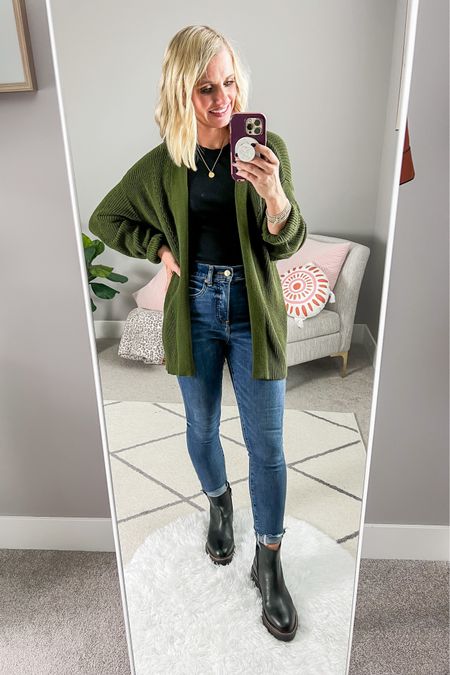 How to style Chelsea boots with skinny jeans rolled at the bottom. You can find more details at thriftywifehappylife.com! Sizing details➡️ top-small || cardigan- xs || jeans- 2/short || boots- 7.5 TTS

#LTKSeasonal #LTKstyletip #LTKfindsunder100