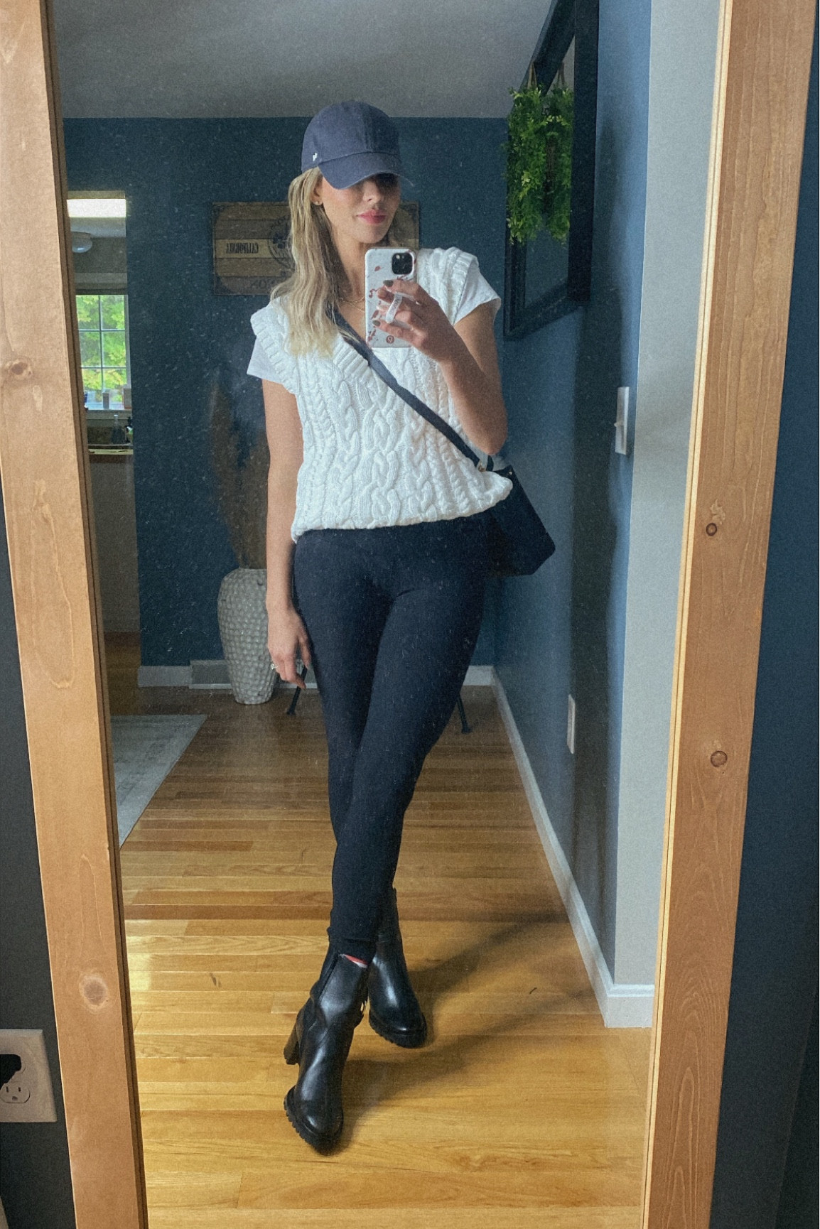 Perfect fall weekend look . White sweater vest over the perfect white vintage v neck JCrew tee 
Black align lululemon leggings 
Black Lagos booties Rockport 
Hat from Amazon 

#LTKstyletip #LTKunder100 #LTKunder50