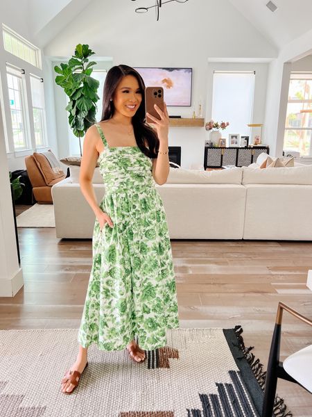 Green floral midi dress that is perfect for summer! I love the wide straps, midi length, floral pattern and that it has pockets. Super flattering on! Only in stock in select sizes and a few different color ways

#LTKsalealert #LTKSeasonal #LTKstyletip