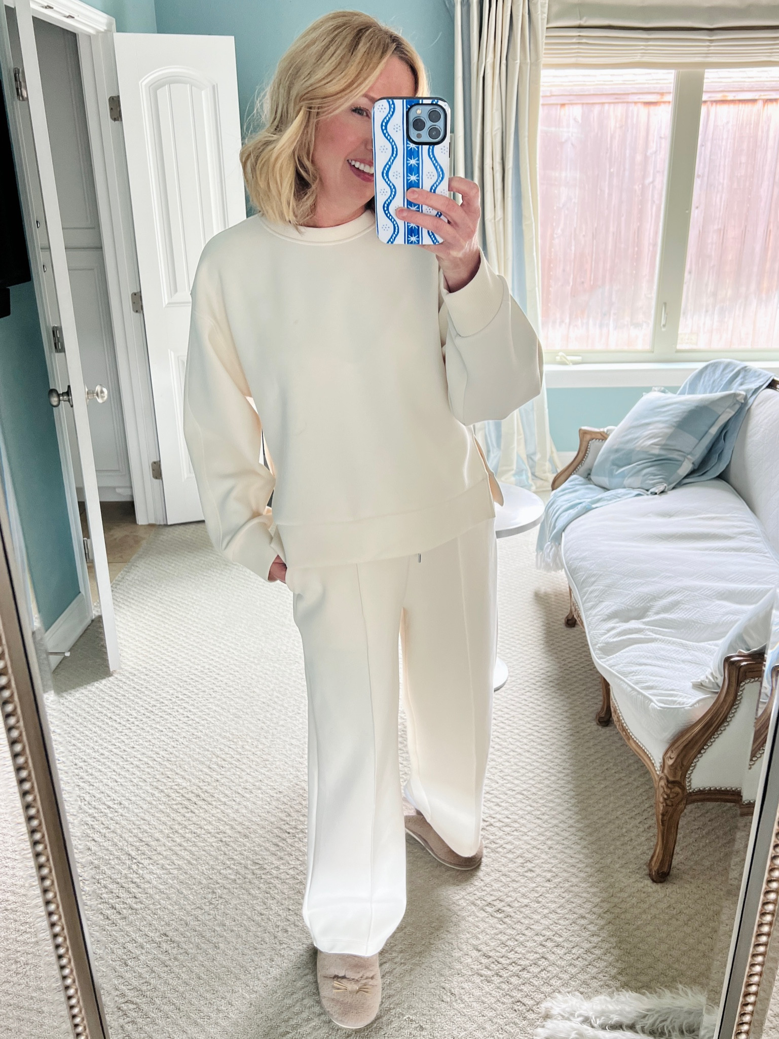 This cold weather calls for a cozy set and bunny slippers🐰🐰
This scuba knit pullover and wide leg pants are so comfy and polished looking! Great for around the house or as a travel set. I have worn mine nonstop this winter! It’s been washed many times and looks good as new. The pants are a drawstring trouser style and have a crisp crease up the front. Sizing is a bit on the large size. I went down one and am wearing a small instead of my usual medium. 



#LTKSaleAlert #LTKMostLoved #LTKActive