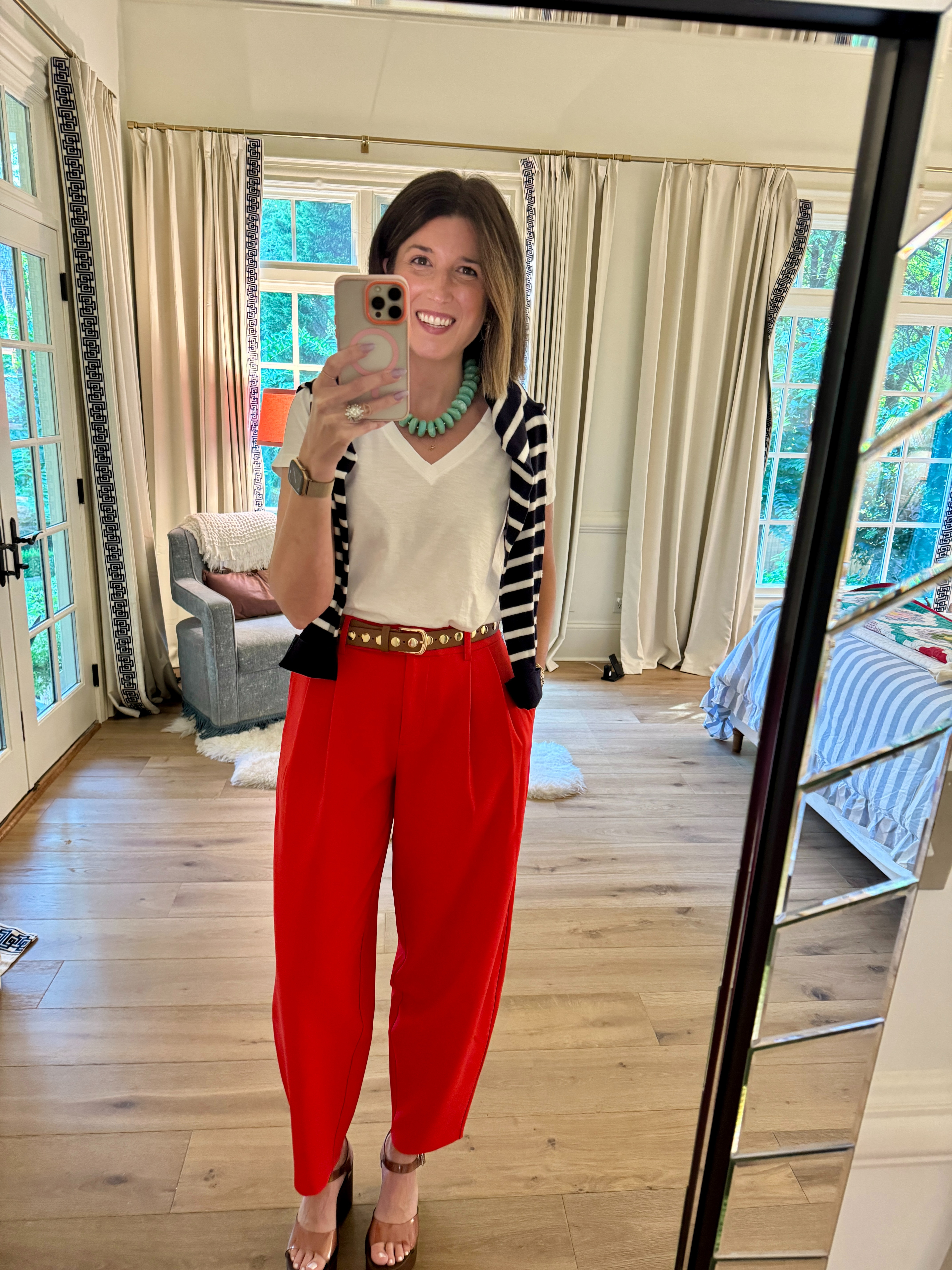 I’ve always loved a white t-shirt. As the kids say, for real, for real. A little white tee paired with a structured-ish pant is an easy go-to. As a self-professed jean addict, I’m trying to diversify my options, because Mama is hot in the summer in blue jeans and not in the good way.

These pants are part of a little collection I picked up with a blazer and an adorable skirt. Cheap, but shockingly good quality:  tight waist, bowed leg, tapered ankle. The trifecta.

Add a chunky necklace and a shoulder sweater, and suddenly it feels finished, not just “thrown on.” Bright pants aren’t always the right call, but they’re a great one to have in your back pocket for a random meeting or a work lunch that needs a little main-character energy. 

 #LTKootd #LTKOver40 #LTKWorkwear