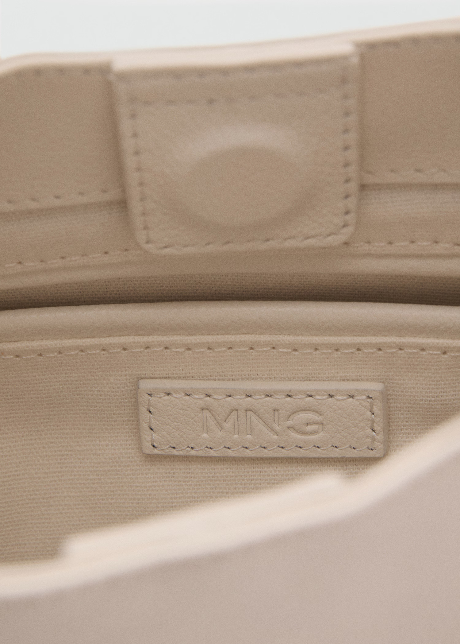 New NowLeather shoulder bag with metal handleCurrent price [£ 119.99]£ 119.99Select a colourWhi... | MANGO (UK)