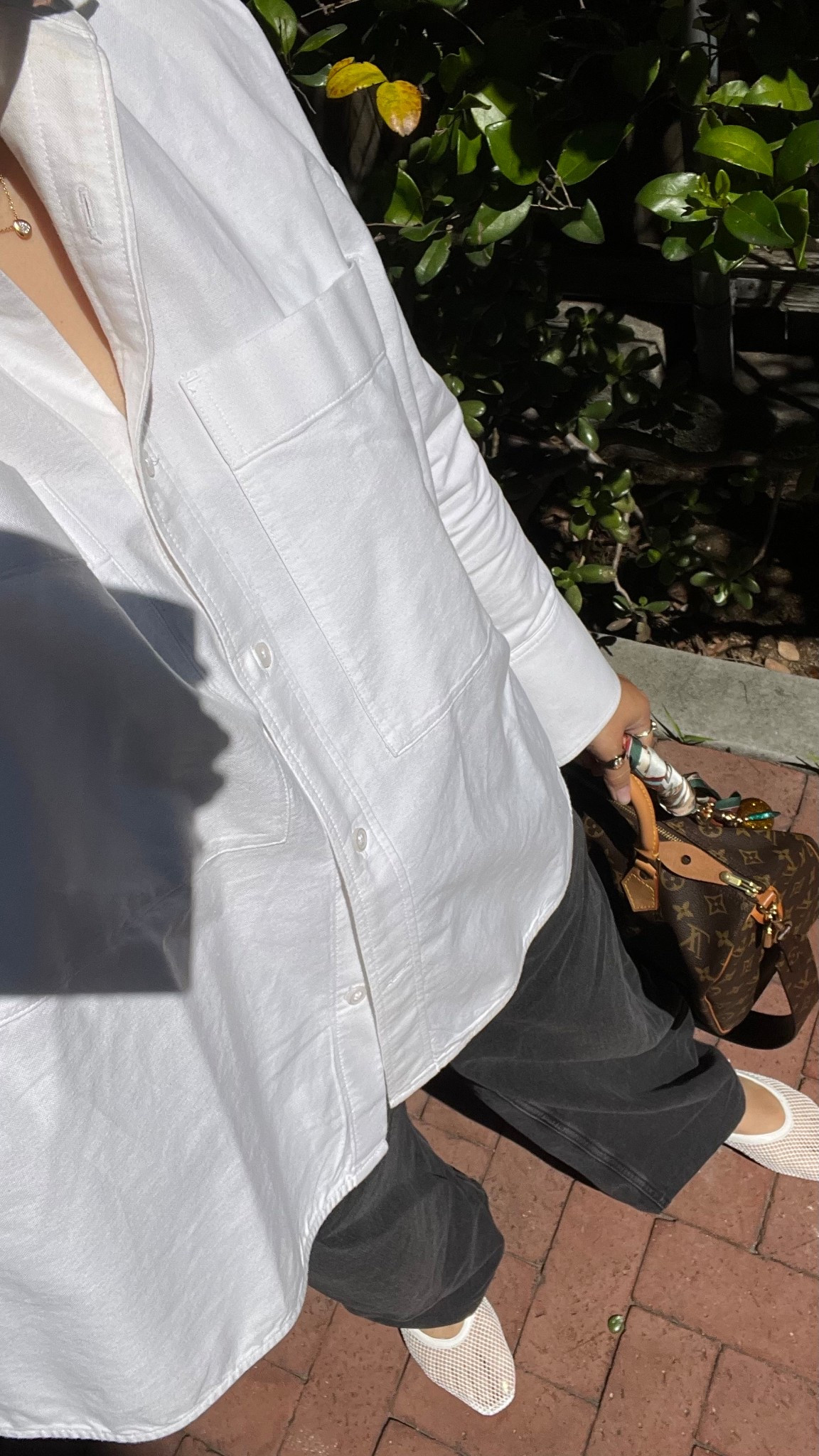 The perfect white shirt! Love the rounded hems and large cuffs. Go down one size for a perfectly oversized fit. ON SALE right now for 15% off!
-
OOTD - fit check - mom fit - running errands outfit - wide leg black jeans - H&M jeans - vintage Louis Vuitton speedy 30 - oversized white shirt everlane - white mesh ballet flats target shoes - eBay Japan speedy 30 under $500

#LTKItBag #LTKStyleTip #LTKSaleAlert