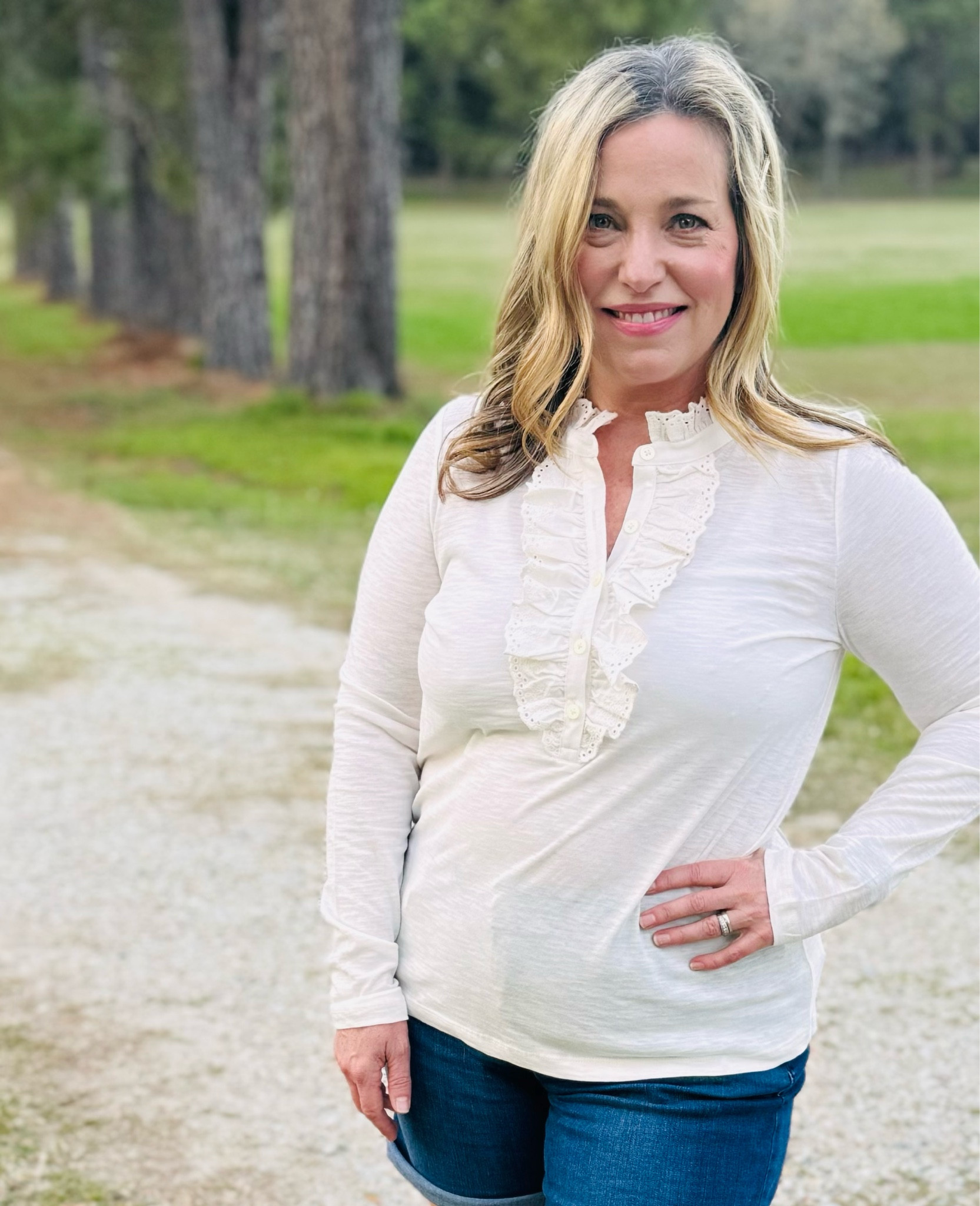 This ruffled top is feminine and pretty and looks great with jeans. Lightweight enough for layering.

#LTKtravel #LTKworkwear #LTKover40