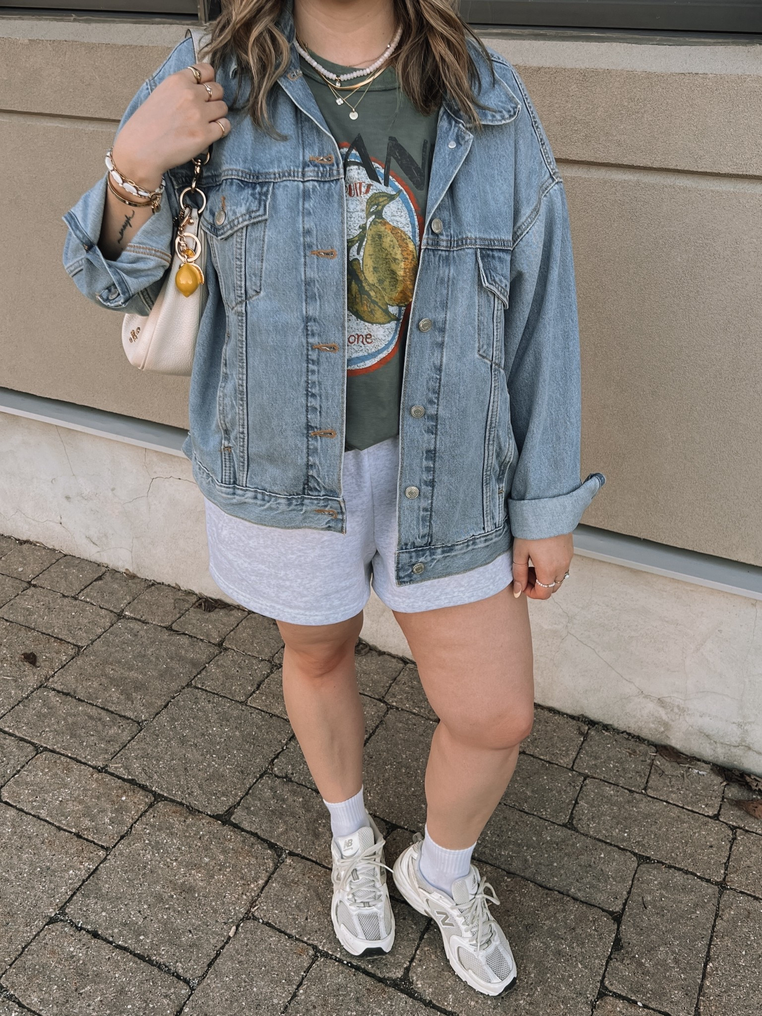 Comfy casual spring to summer outfit! Wearing my usual size L in the sweatshorts and graphic tee. Sized up to XL in the denim jacket, also linked similar. New Balance dad sneakers run a little big, I’m a 9.5-10 and wear a 9

#LTKmidsize #LTKsale #LTKsummer