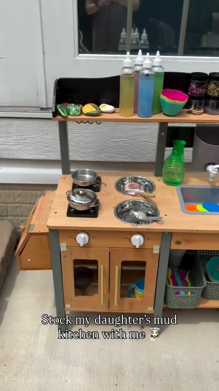 Our mud kitchen is fully stocked for the summer! So many good finds from @hobbylobby & @amazon, but my favorites are the rocks that my sister painted 💕

Comment SHOP for details to be sent directly to you or follow me on @shop.ltk 🛍️🛍️🛍️

#toddlermom #momlife #toddlerlife #toddleractivities #summer mud kitchen restock | get outside | outdoor play | screen free activities | summer play ideas |