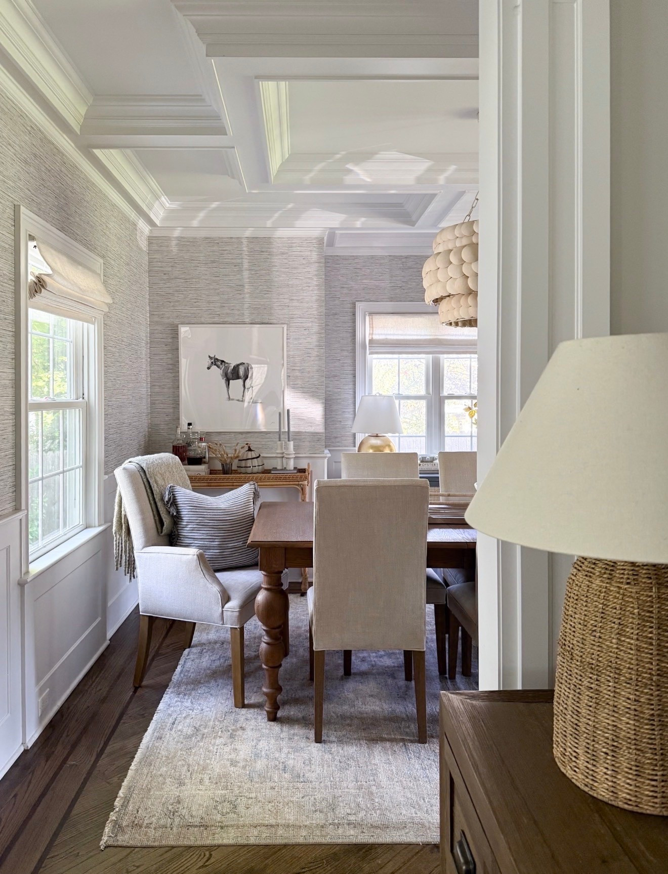This dining room is all about the layers. Warm wood, woven textures, soft neutrals, and that coffered ceiling give the space so much character without feeling overdone. The kind of room that makes you want to linger at the table a little longer.

dining room decor, dining room inspiration, neutral interiors, traditional home decor, collected interiors, coffered ceiling, warm wood furniture, woven lighting, layered home decor, timeless interiors, interior design inspiration, girlonthehudson

#LTKSeasonal #LTKHome