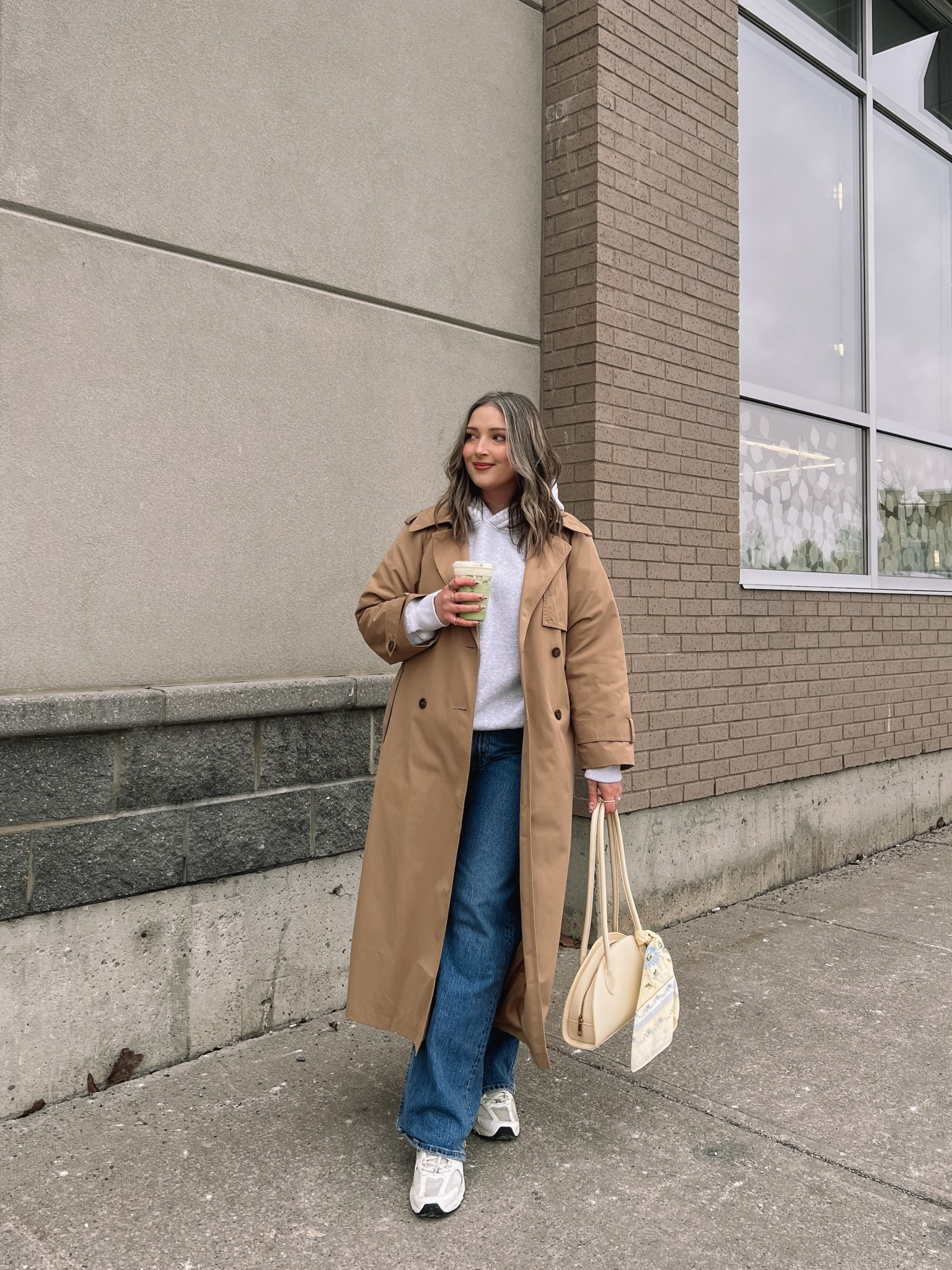 Spring outfit for a chilly day! Code SPRINGAF for extra 15% off at Abercrombie! Wearing my usual size L in the classic water resistant trench coat. Hoodie runs small, sized up to XL. Wearing 32 in the jeans, could have done 31 but I like a looser fit. New Balance sneakers are so comfy but run big, I’m a 9.5-10 and wear a 9. Butter yellow bag and scarf are Old Navy, Canadian links under similar products.


#LTKsale #LTKmidsize #LTKjeans