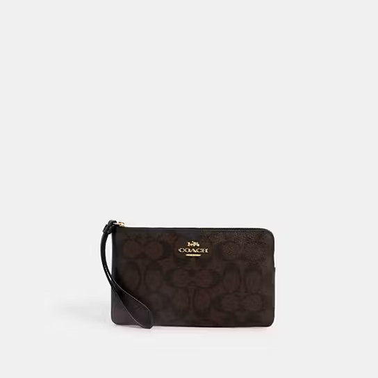 Large Corner Zip Wristlet In Signature Canvas | Coach Outlet US