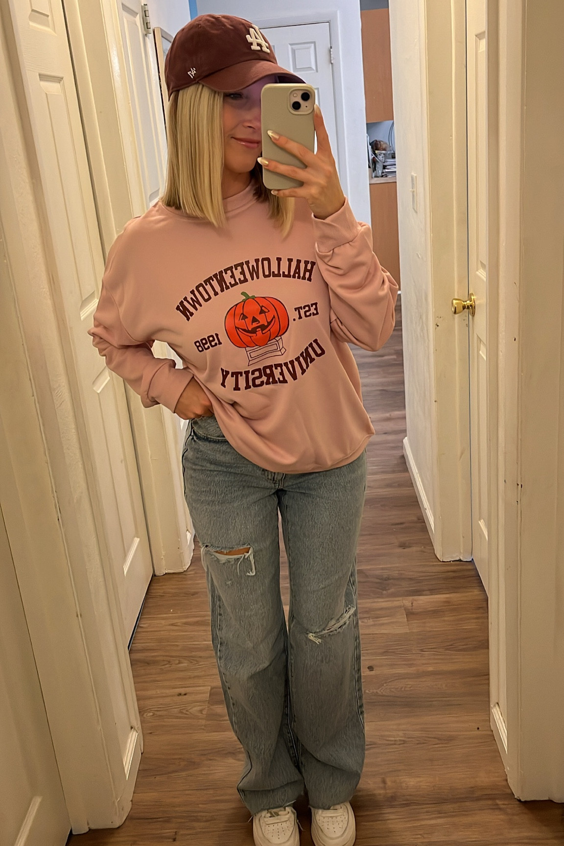 Fall outfit, Halloween sweatshirt, Halloween fashion, fall fashion, Halloween, halloweentown, baggy jeans, wide leg jeans, mom jeans, brown baseball hat, baseball hat, baseball cap