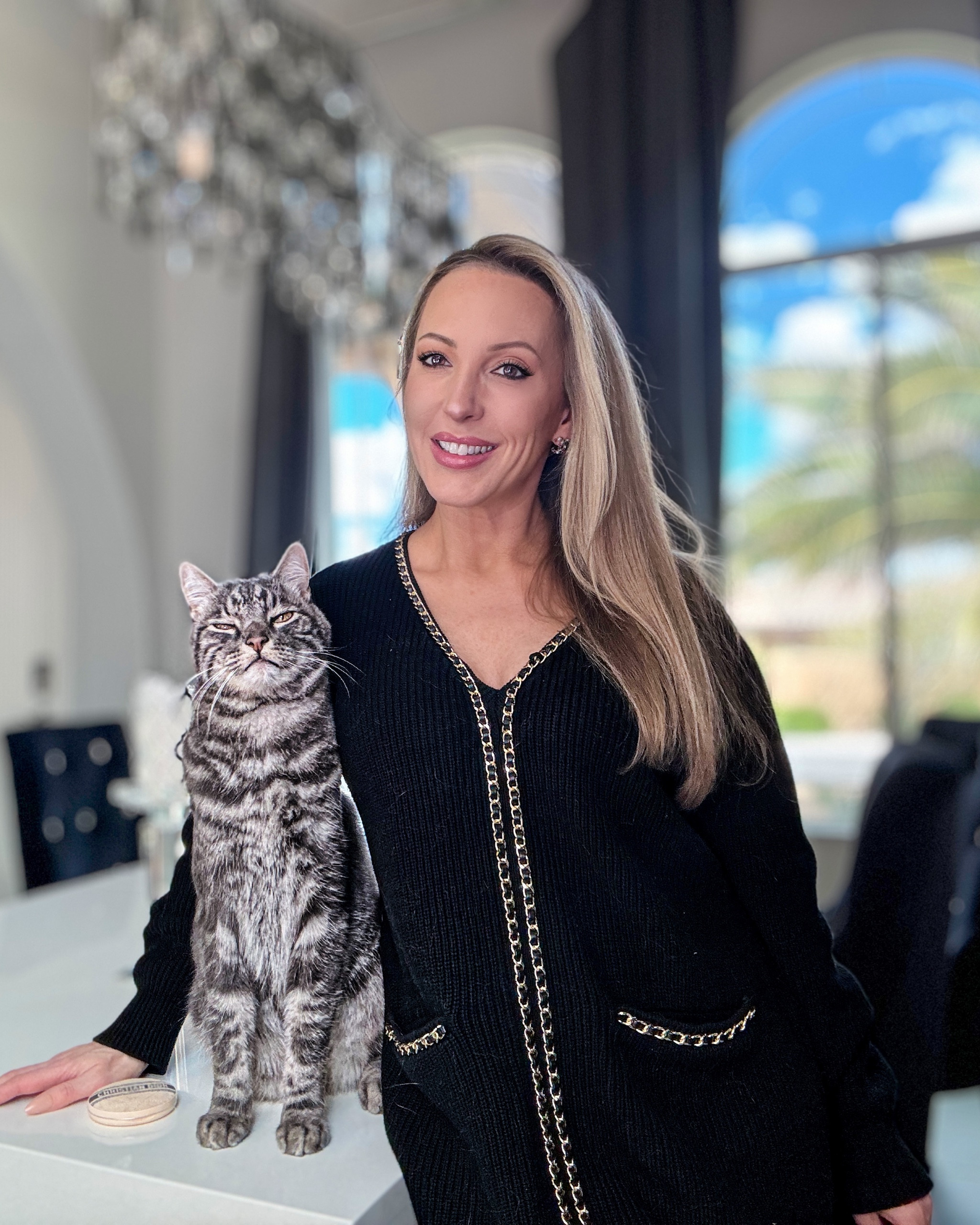 Fall outfit idea / Fall dress: One of my favorite short black sweater dresses. The black chain details are giving Chanel vibes, it’s comfy, warm and has functional pockets. Star says Hi too 🐈‍⬛ It’s warm enough to wear as a winter outfit too, just add tights or leggings. 

#LTKSaleAlert #LTKSeasonal #LTKStyleTip