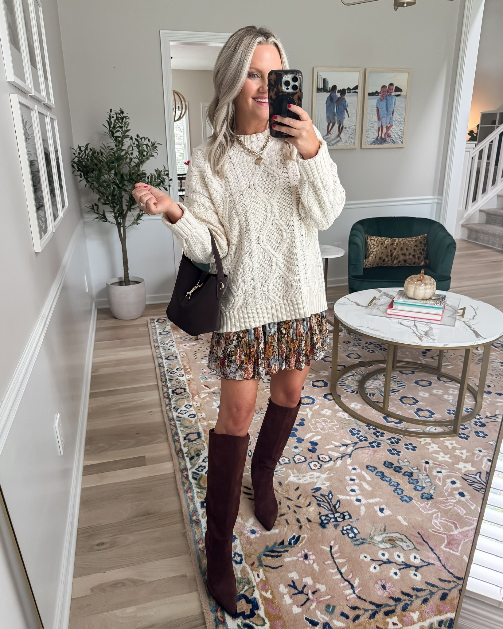 This sweater and skirt combo is giving the prettiest fall vibes 🤎 I love the oversized cable knit with the flowy floral skirt and tall suede boots. The mix of cozy textures and feminine details makes this such an easy outfit for fall days, brunch, or a weekend out.

cable knit sweater, floral skirt, suede boots, fall outfit, cozy fall style, sweater outfit, skirt outfit, fall layering, tall boots outfit, feminine fall fashion, lovelylifestyling

#LTKootd #LTKSeasonal #LTKOver40