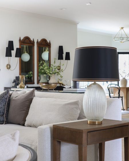 Loving this fluted glass lamp from Target paired with this black lamp shade with gold piping. Such a high end look for less!

#livingroom #lighting

#LTKunder50 #LTKhome #LTKstyletip