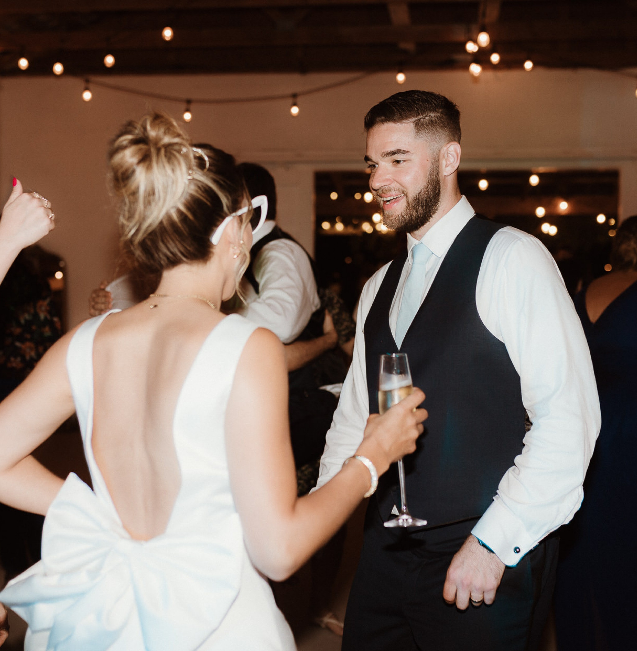 Obsessed with my second wedding dress that I changed into for the reception! The bow train can be made removable via a button and it has built in cups. Satin, chic, and so comfy 

#LTKstyletip #LTKwedding