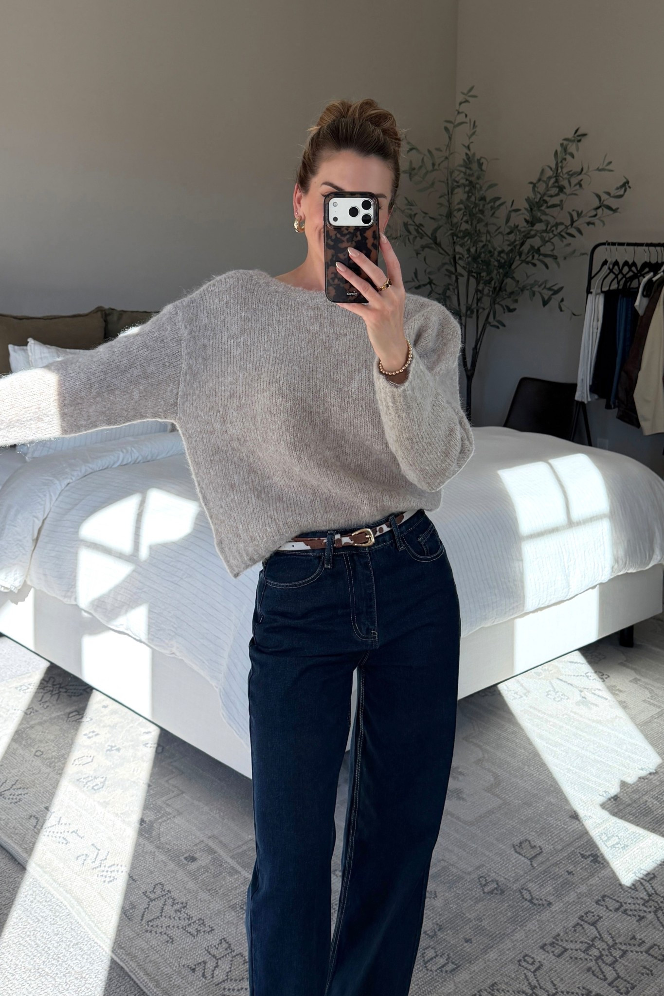 One of my favorite sweaters this season! Simple in the front with a twisted open back. So cozy yet chic! Wearing size small. Code nicholeciotti_12 for 12% off sitewide. 

#LTKHoliday #LTKFindsUnder50 #LTKSeasonal