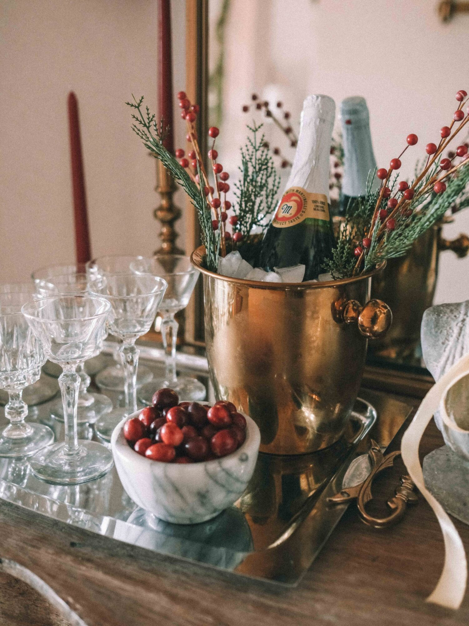 If you’re getting ready to host a party, a bowl of cherries is an easy and inexpensive way to add a pop of color to your tablescape or bar. This makes any decor layout look more interesting and adds color to a spread of neutral or crystal glassware. A marble bowl is the perfect way to display them, which looks great next to a gold or brass champagne bucket! 

 #LTKHoliday #LTKSeasonal #LTKHome