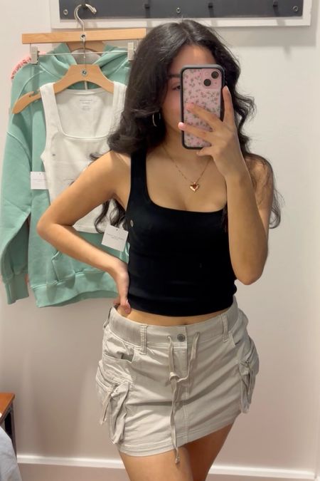 SKIMS dupe tank from American Eagle!! Fits just like the cotton rib tank but it's thicker. Wearing size xs

Also love this cargo mini skirt. So comfy and has built in shorts! Wearing size 0

#LTKstyletip #LTKSpringSale #LTKfindsunder50