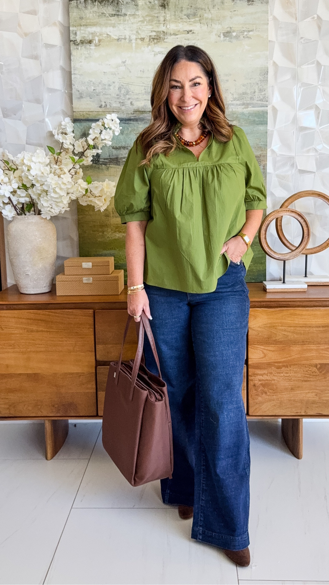 Fall outfit with the prettiest top 🫒 Olive green puff-sleeve cotton blouse tucked into dark wash high-waist wide-leg jeans with a brown belt, finished with brown suede pumps. A casual-chic teacher outfit and business casual look in rich fall tones.

Sizing: top tts, large // jeans run large need 10 wearing 12

#LTKWorkwear #LTKOver40 #LTKMidsize
