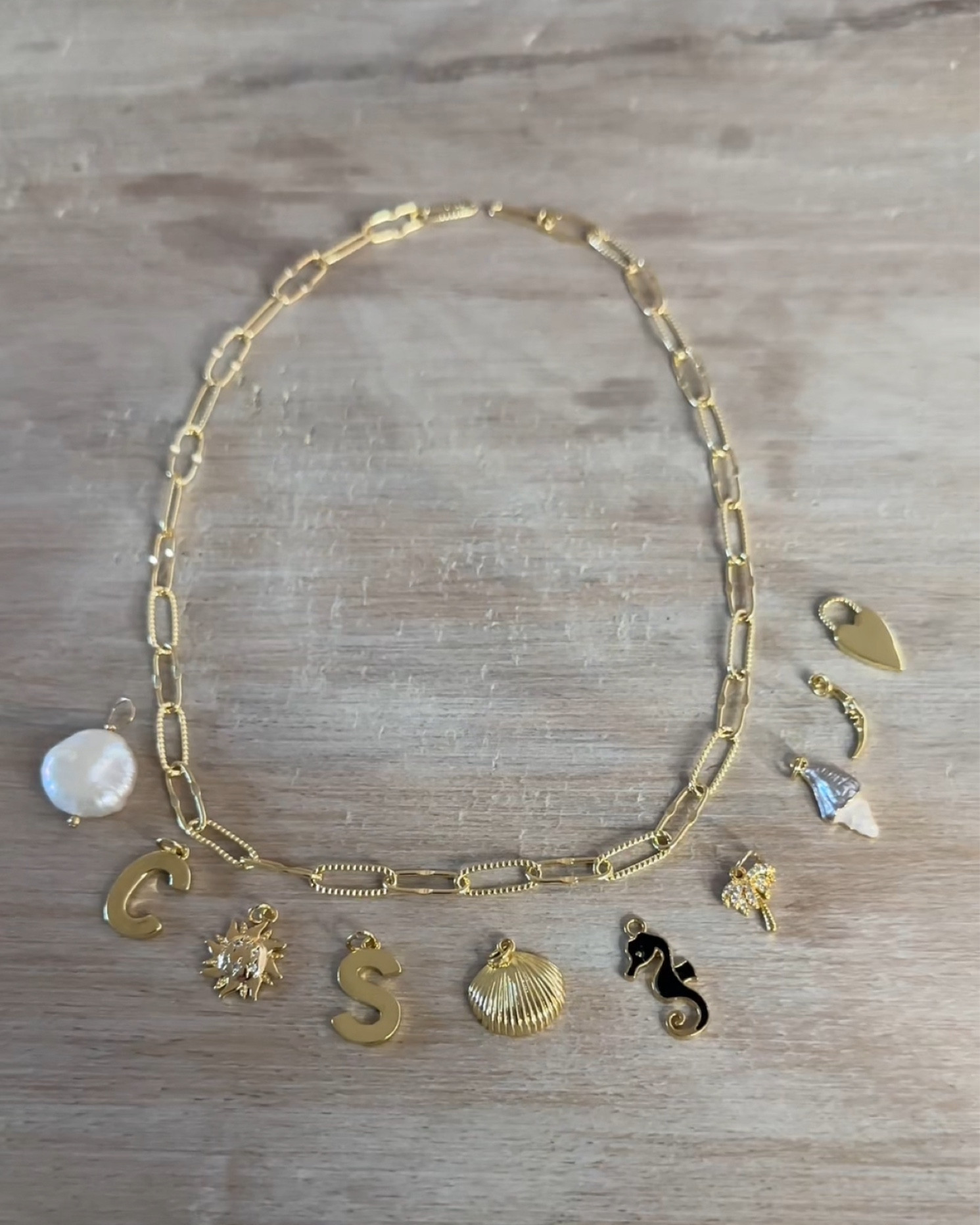 Charm necklace DIY: linked everything I used to make this myself! Gold-filled chain so it won’t tarnish. 

#LTKStyleTip