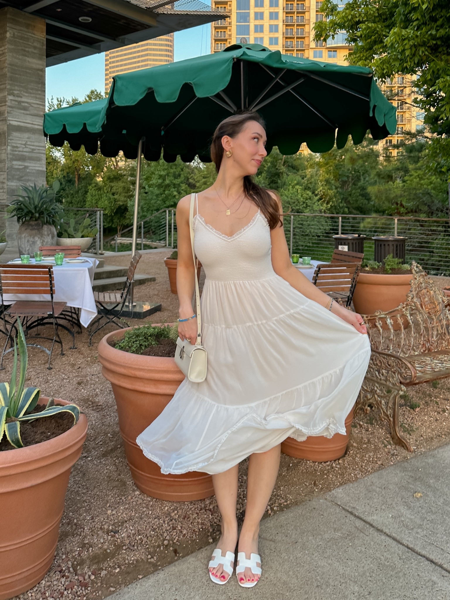 loving this twirly dress for all kinds of summer activities & outings! I got it in two colors so far - off-white (light birch) & black - because I love it so much 🤍🦢🎞️ 

• wearing size s - fits tts 
• adjustable straps 
• lined - white is NOT sheer yay 

[girly feminine dress inspo, garden party, bridal shower, engagement party, wedding occasion midi dress, chiffon pleated mididress, aritizia clientele sale haul finds, easy ootd, date night look, neutral chic style, cami tank maxidress inspo]

#LTKStyleTip #LTKParties #LTKShoeCrush