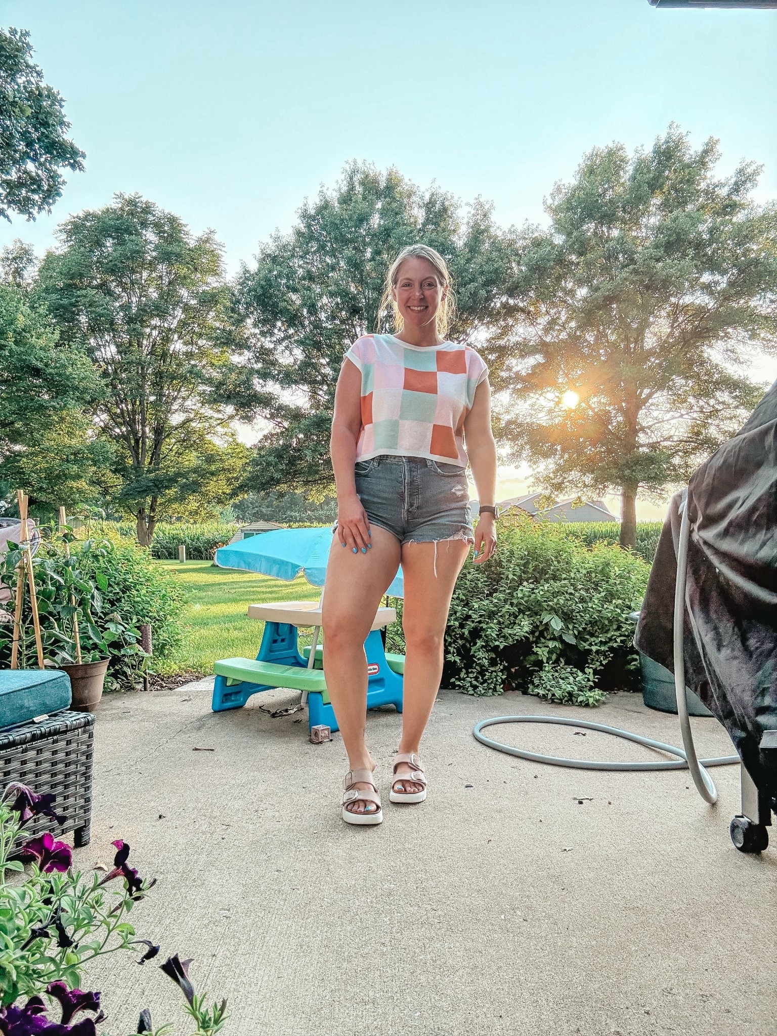 Casual Summer Outfit for Midsize Mamas – Easy, Bright & Comfortable!

Living in this fun and colorful checkered cropped tee and comfy high-waisted denim shorts this summer! I’m 160 lbs, wearing a size medium top and size 10 shorts – both fit true to size with a little stretch where you need it. These exact shorts are older style but I’ve linked similar!

Paired it with my favorite neutral platform sandals that are comfy enough for chasing kids in the backyard or running errands.

🍉 Bold, playful pattern
🍉 Midsize & mom-bod approved
🍉 Great everyday outfit for hot weather

📲 Shop this full look on my LTK!
#casualsummeroutfit #midsizefashion #momstyle #summerootd #checkeredtee #denimshorts #size10style #midsizemama #LTKsummer #LTKcasualstyle #LTKfitcheck

#LTKShoeCrush #LTKFindsUnder50 #LTKMidsize