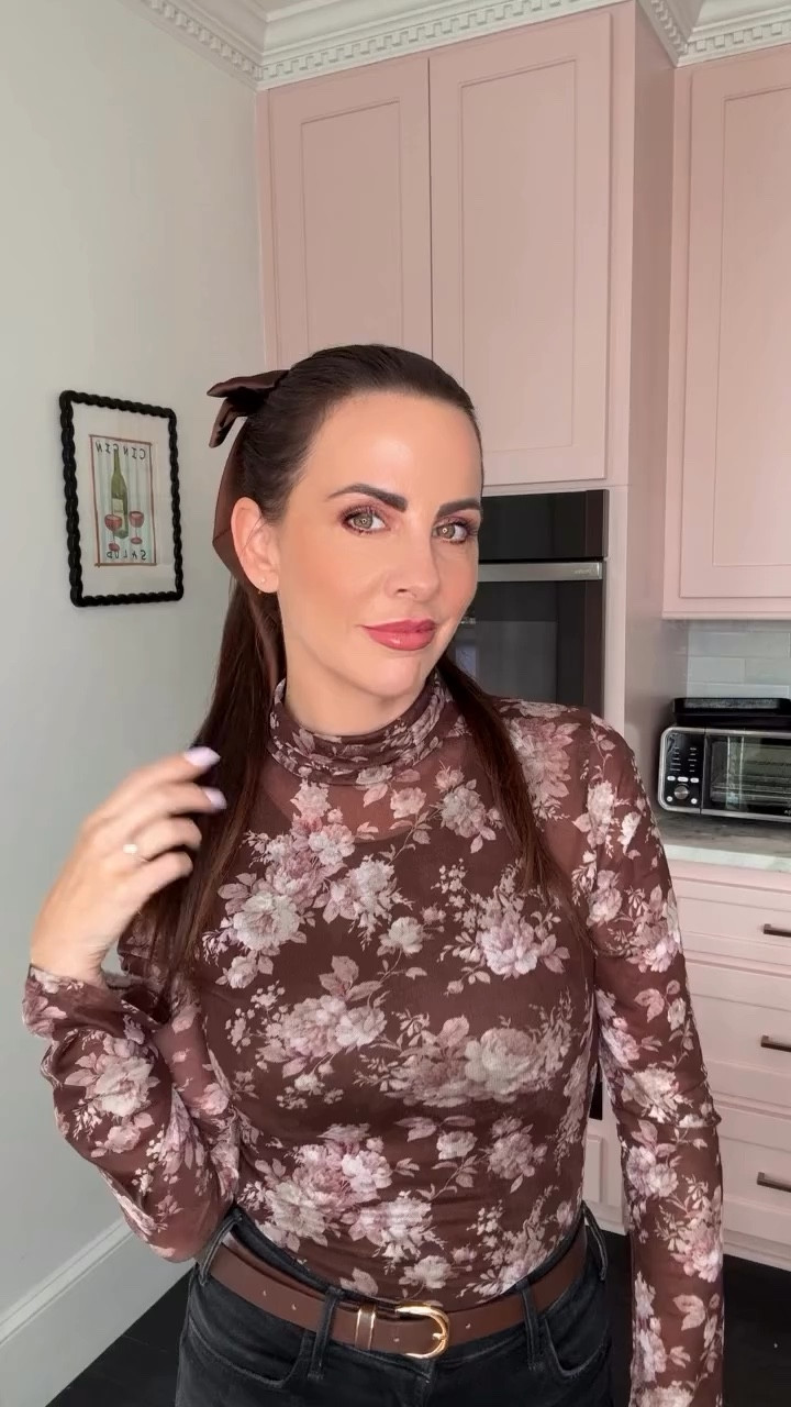 One of my go-to looks for a cooler Charleston day 🤎✨

These Mother “Roller Flare” jeans in Not Today Satan are everything—high waisted, insanely flattering, and give the booty the perfect little lift. I love how the wide leg just kisses the floor for that effortless, elongated vibe.

Paired it with this dreamy sheer floral bodysuit from Priceless, my Dolce Vita boots, and of course… a bow to top it all off 🎀

Effortless, feminine, and just the right amount of edge.

Follow my LTK for more of my favorite looks 💫