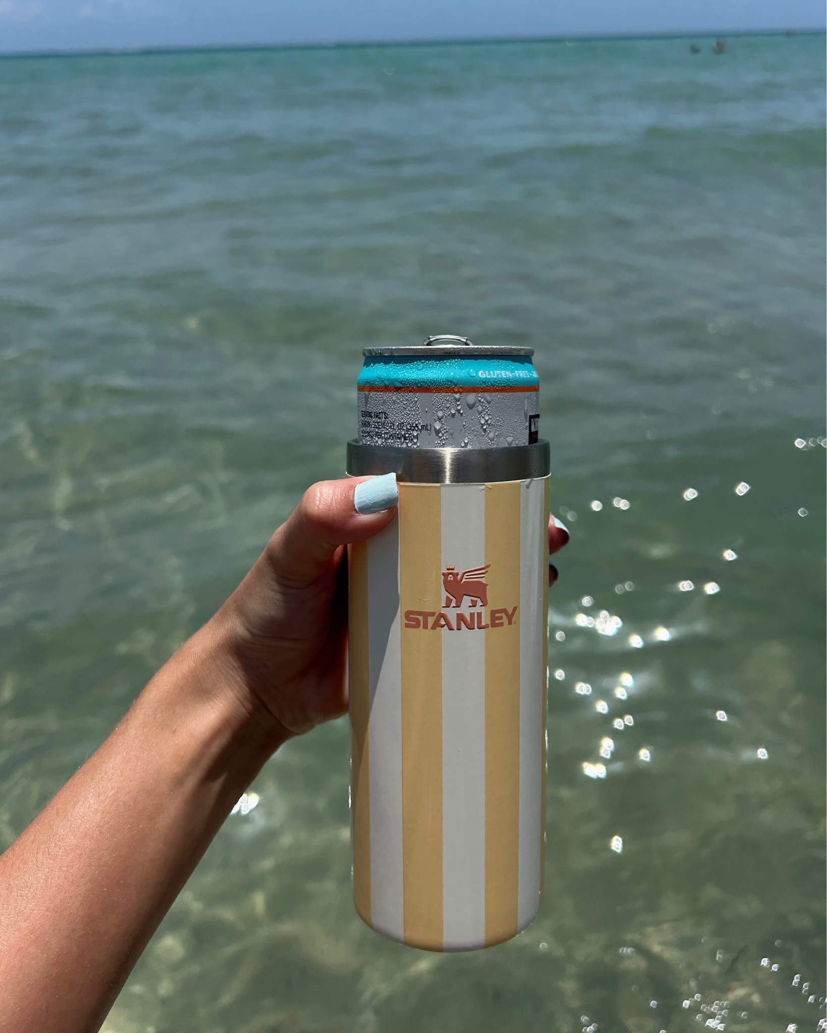 Stanley Slim Can Cooler 💛 perfect for keeping your drink cool this summer!!

#LTKSummerEdit