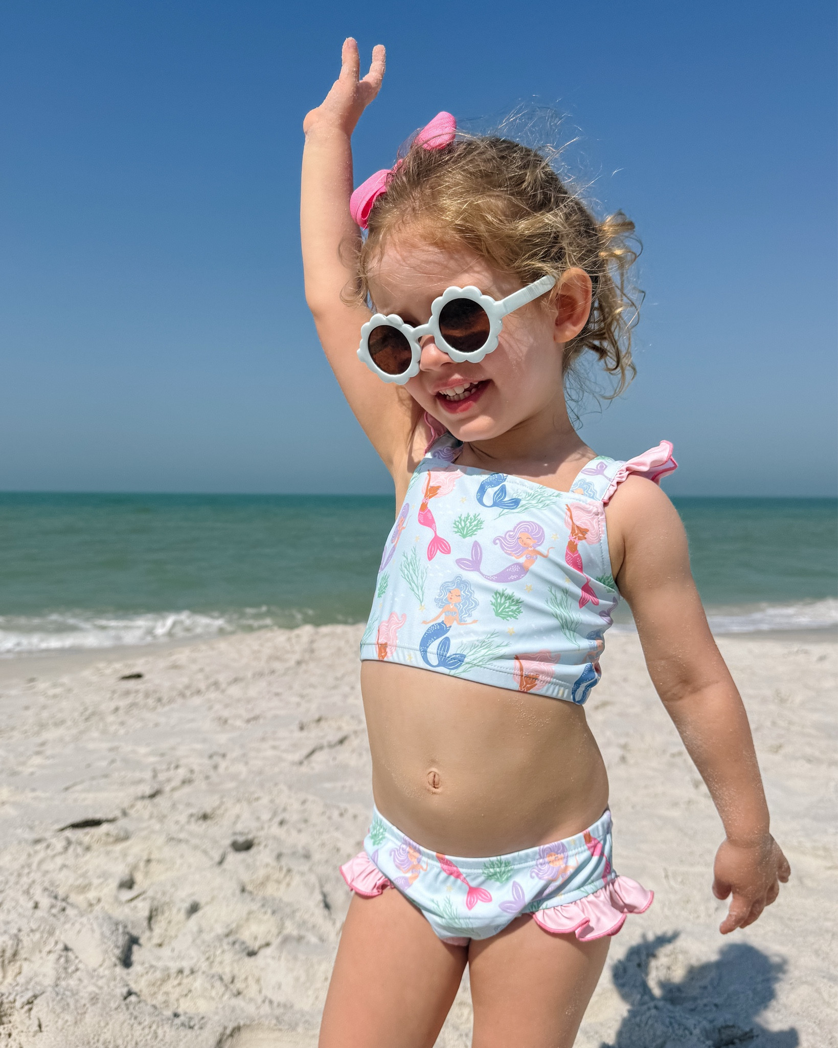 Girls just wanna have sun! ☀️ Blair is wearing the cutest mermaid bikini from @shrimpandgritskids 🧜🏼‍♀️ Comes in a one-piece too, Blair is in the XS

#LTKKids #LTKFamily