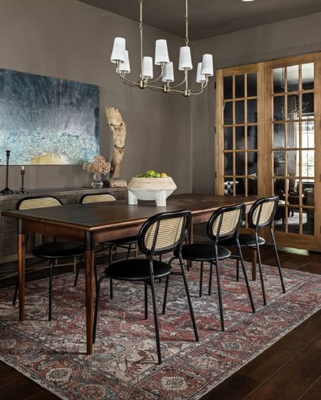 Dark wood and natural tones brought the dining space to life.

#LTKhome