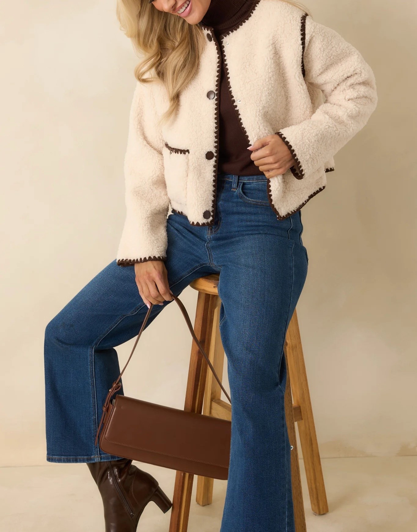 Style in the cutest sherpa jacket this winter! The BOUND TO BE COZY IVORY & CHOCOLATE BROWN CONTRAST STITCH SHERPA JACKET is under $70.

Keywords: Faux fur coat, faux leather coat, faux fur jacket, teddy coat, cropped teddy coat, sherpa jacket, wool coat, trench coat, coatigan, cardigan, winter outfits, winter coats, winter outfits for women, winter work outfits, winter work coats, moto leather jacket 

#LTKgrwm #LTKFindsUnder100 #LTKootd