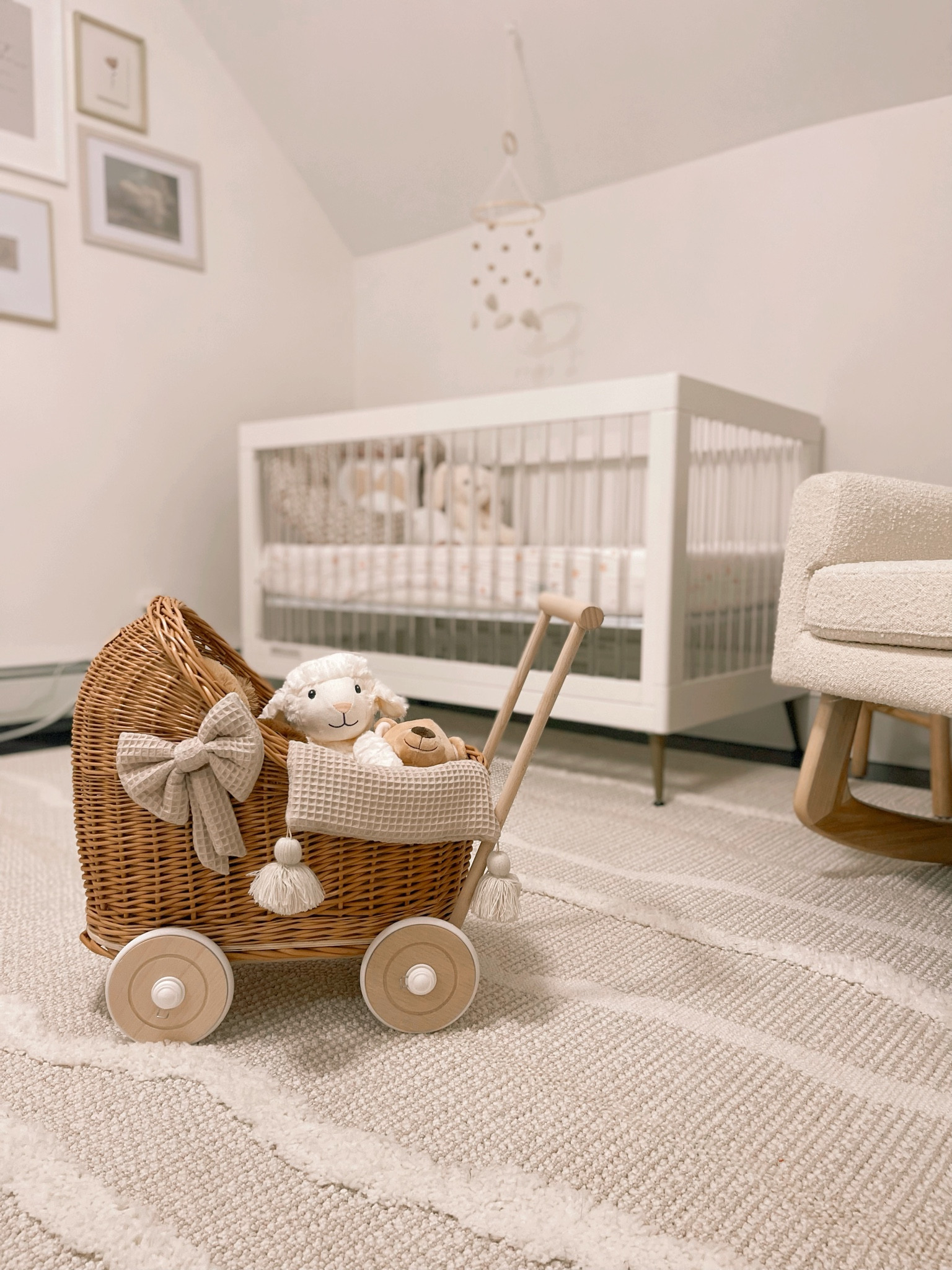 Neutral nursery, doll pram, acrylic crib, white crib, boucle rocker, girl nursery, cloud nursery 

#LTKbump #LTKhome #LTKbaby