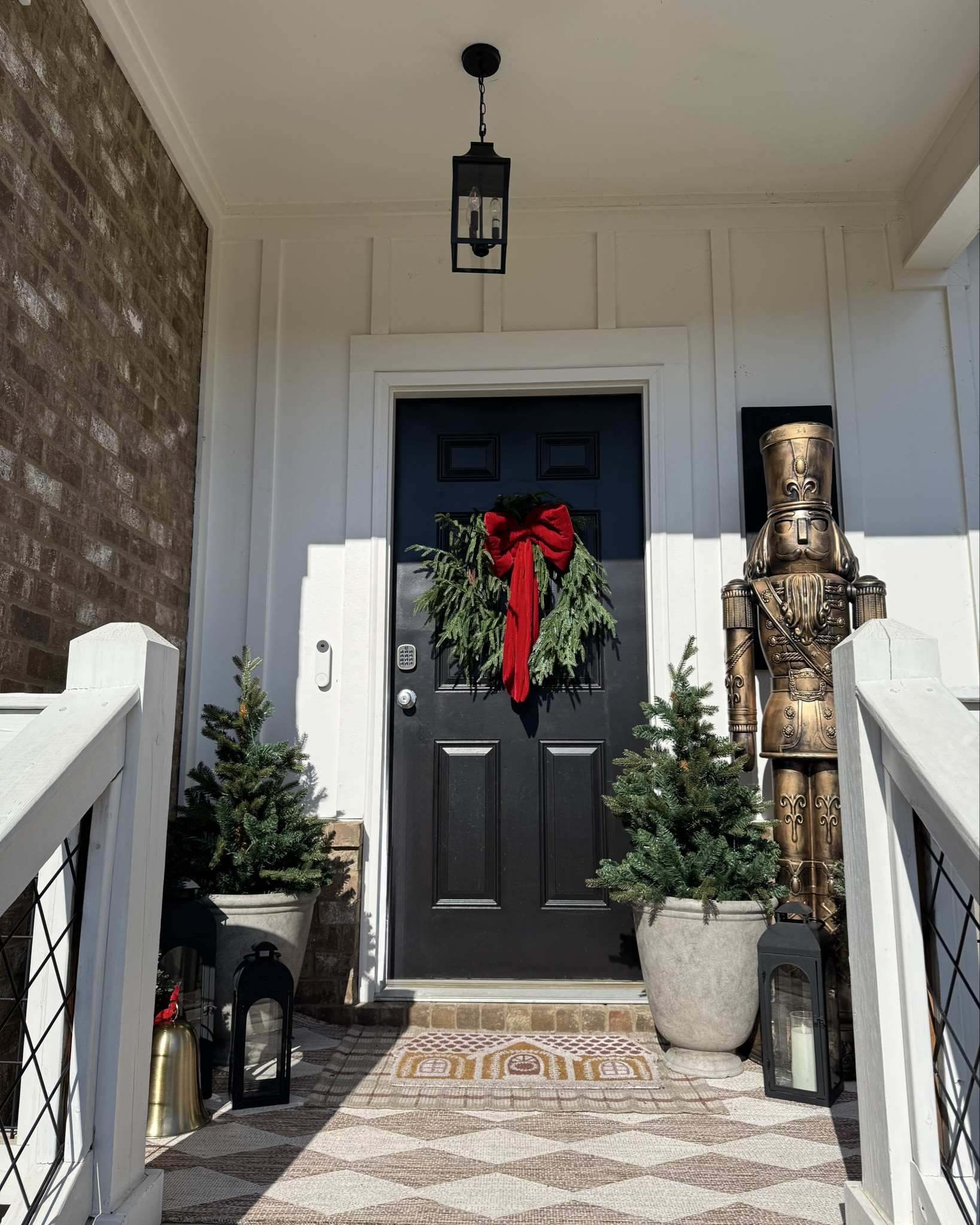 Outdoor Christmas front porch decor! The trees light up and are on sale so run!!! 

#LTKHoliday #LTKHome #LTKSeasonal