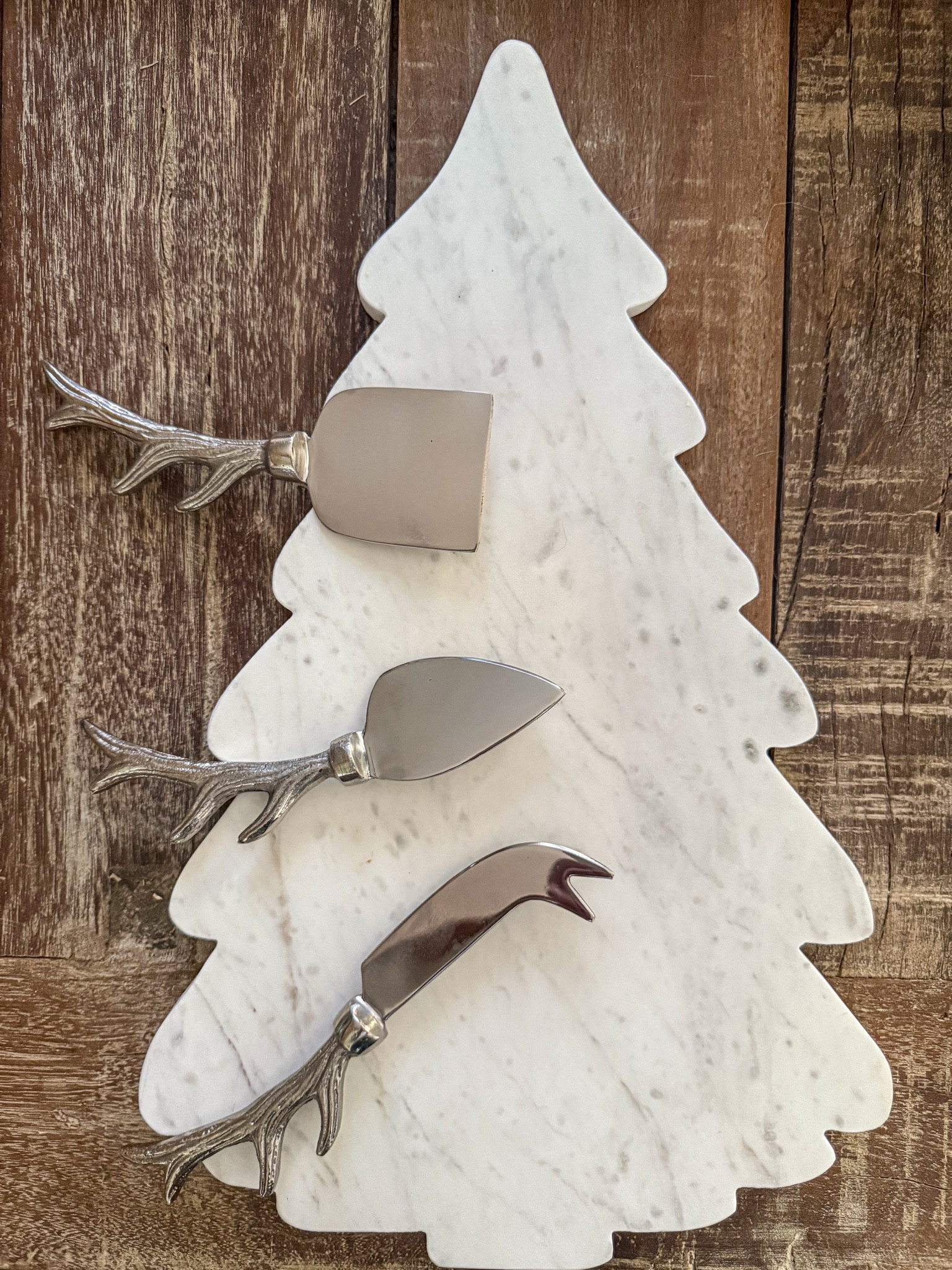 Love this marble Christmas tree cheese board and these antler cheese knives! They are perfect for your holiday party!! ❤️🎄

#LTKHoliday #LTKParties #LTKSaleAlert
