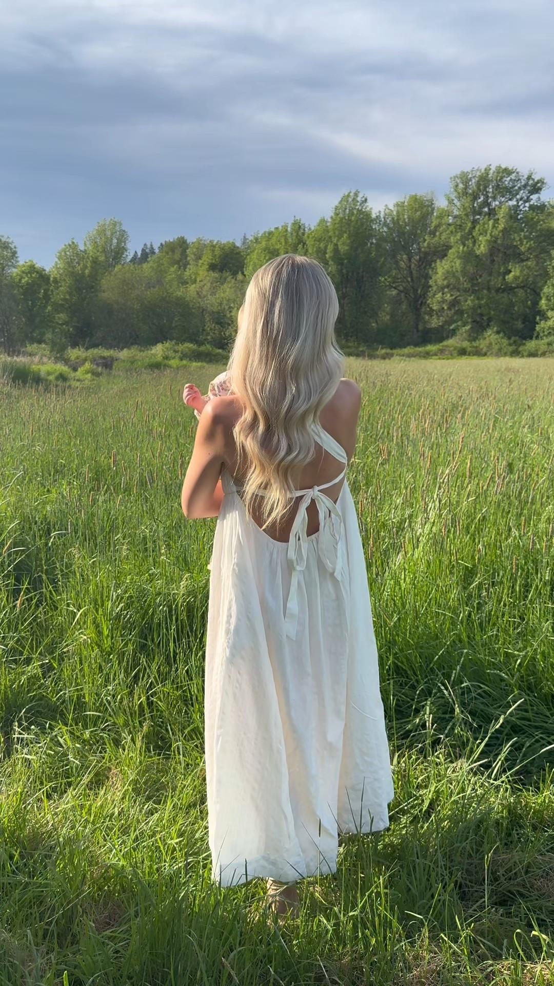 The most stunning free people dress!! Linked my earrings as well 🤍 #freepeople #whitedress #strappydress #springdress #summerdress #goldearrings #mididress 

#LTKWedding #LTKStyleTip #LTKSeasonal