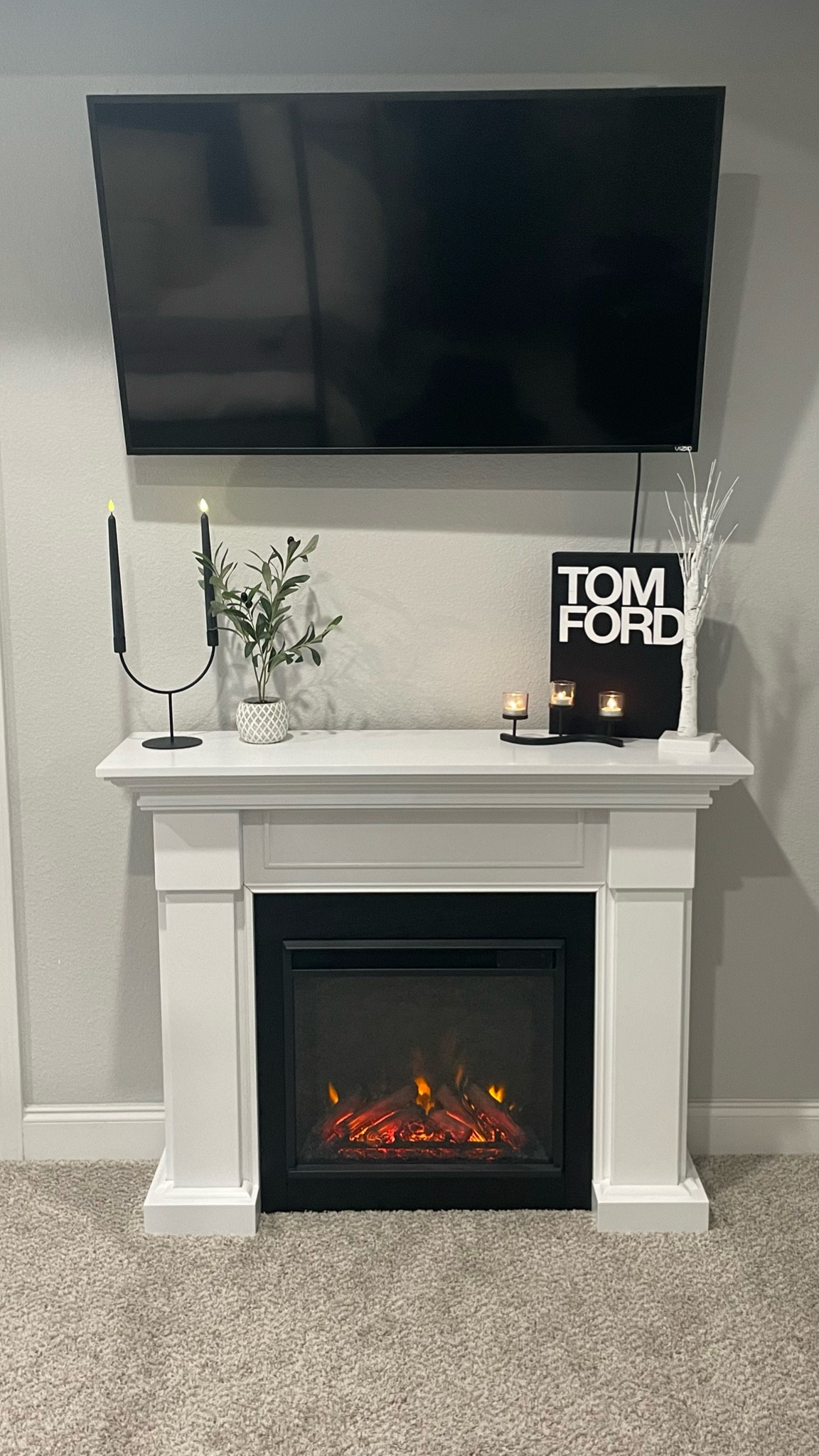 Modern bedroom, modern mantle styling, black and white home decor, electric fireplace, Tom ford book, olive tree, winter bedroom styling, modern home decor, Bedroom room, bedding, Modern bedroom decor, neutral home, modern home, minimalist home, modern style, modern bedroom, bedroom inspiration, modern home, minimalist home decor, organic home, home styling ideas, bedroom

#bedroomdecor
#bedding
#bedroominspiration
#bedroominspo
#Modernhome
#NeutralHomeDecor
#Organicmodern
#Cleanhome
#Aesthetic 
#InteriorDesign 
#Modernorganic 
#Budgetfriendly 
#NeutralHome
#MinimalistHome
#Organichome
#ModernAesthetic
#neutraldecor#LTKVideo 