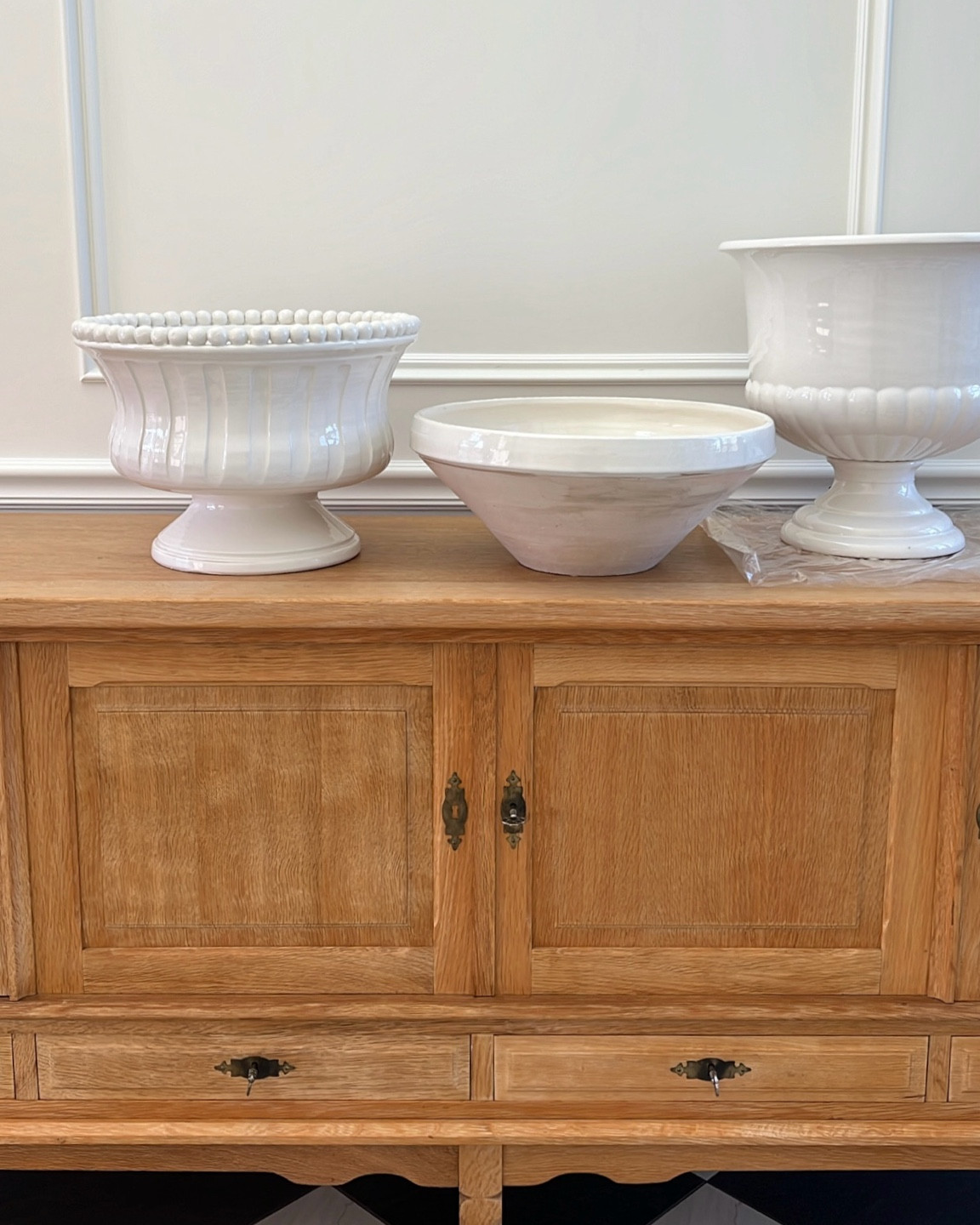 Unboxed some of my favorite oversized white pottery today. Grouping any collection with multiple pieces of similar items makes for an easy & big impact. 

#whitepottery #footedurn #pottery

#LTKHome #LTKStyleTip