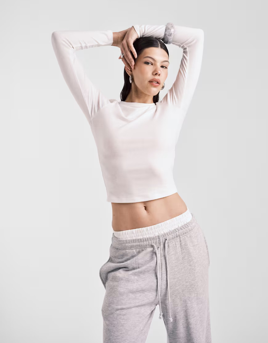 ASOS DESIGN soft long sleeve shrunken tee in cream-White | ASOS (Global)