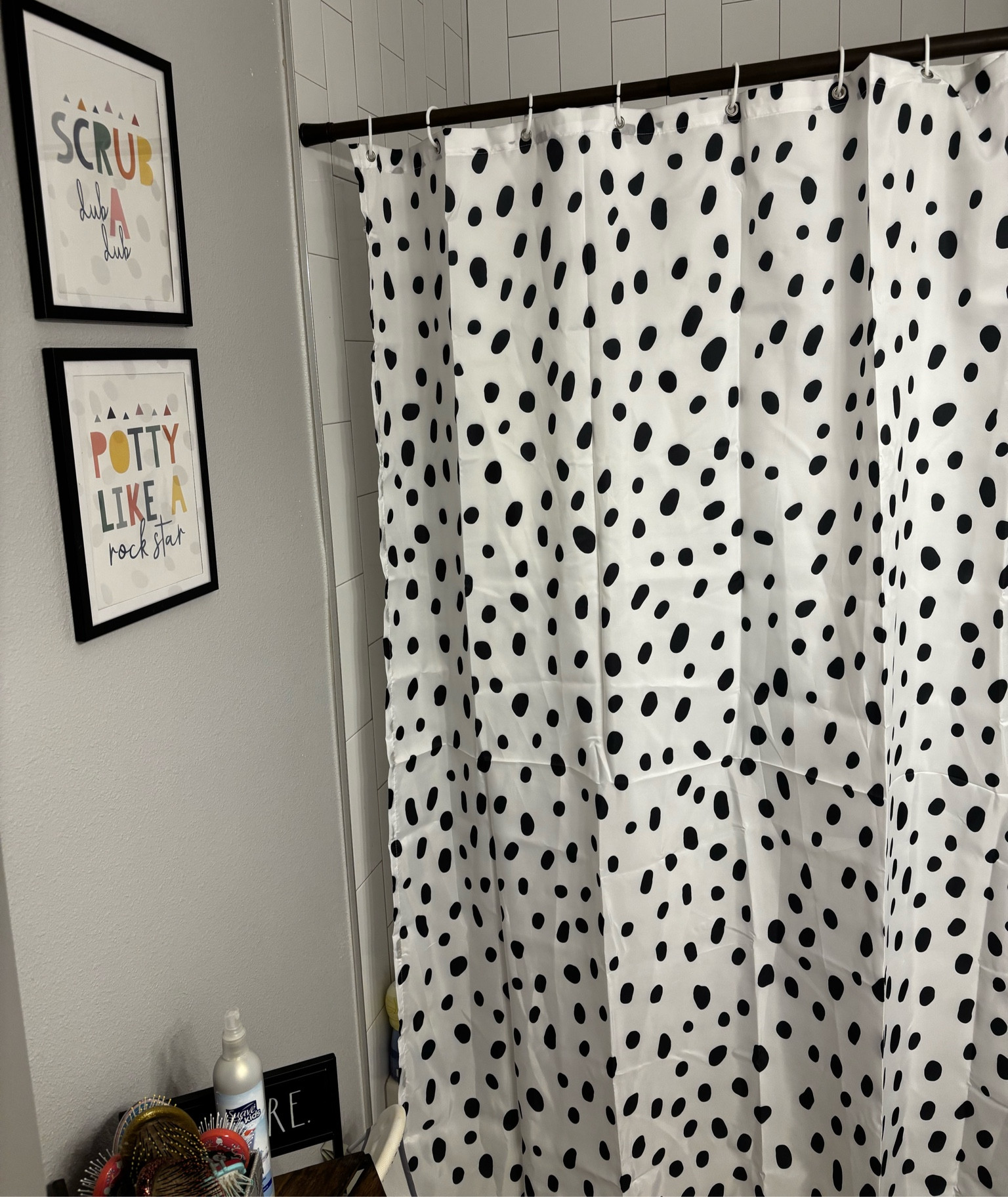The kids got a bathroom redo for Christmas! I love the pop of color with the Dalmatian print curtain 