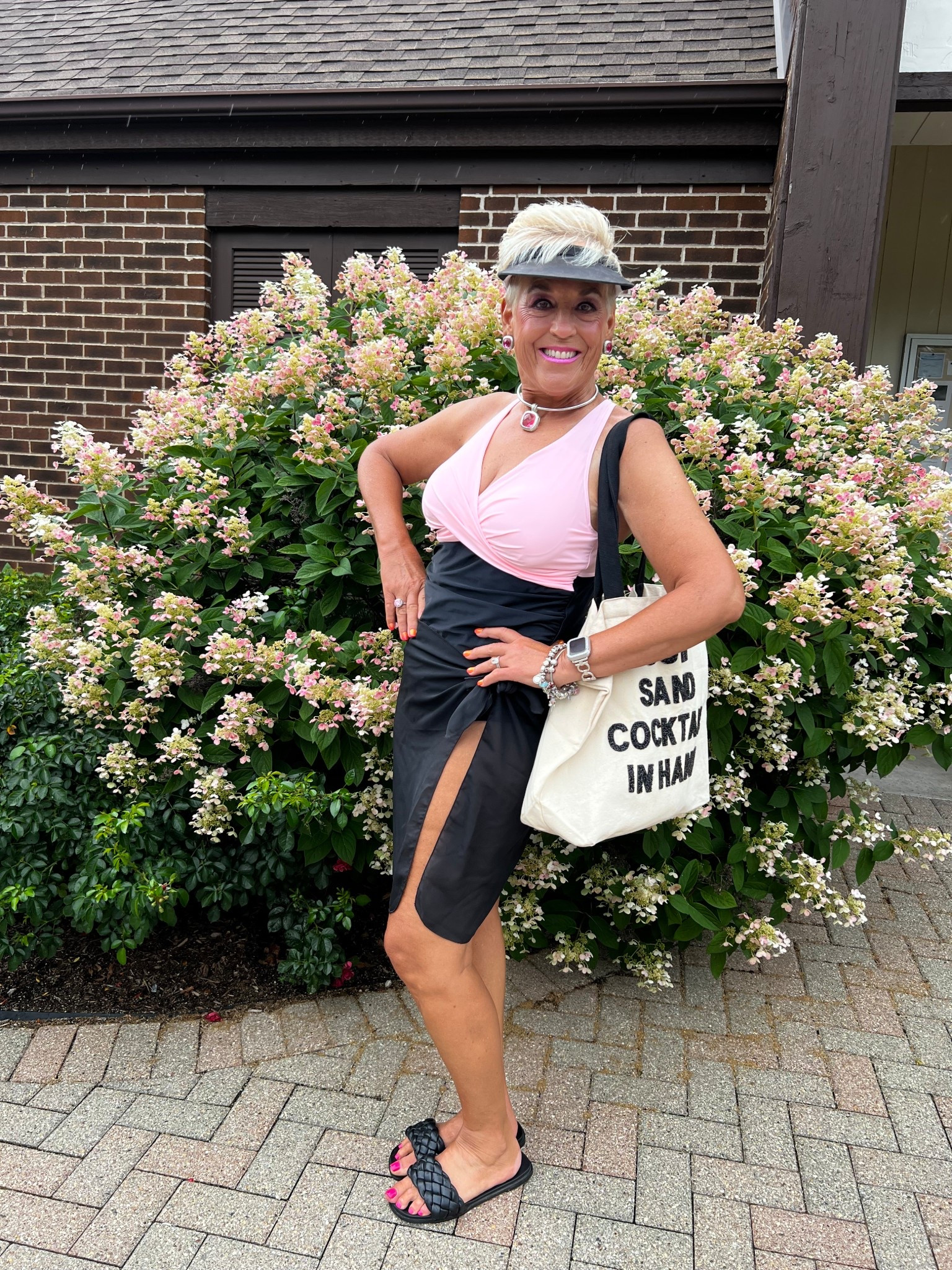 Light Pink and Black Tankini Top
Black Swim Bottoms
Black Coverup Skirt
Black Visor