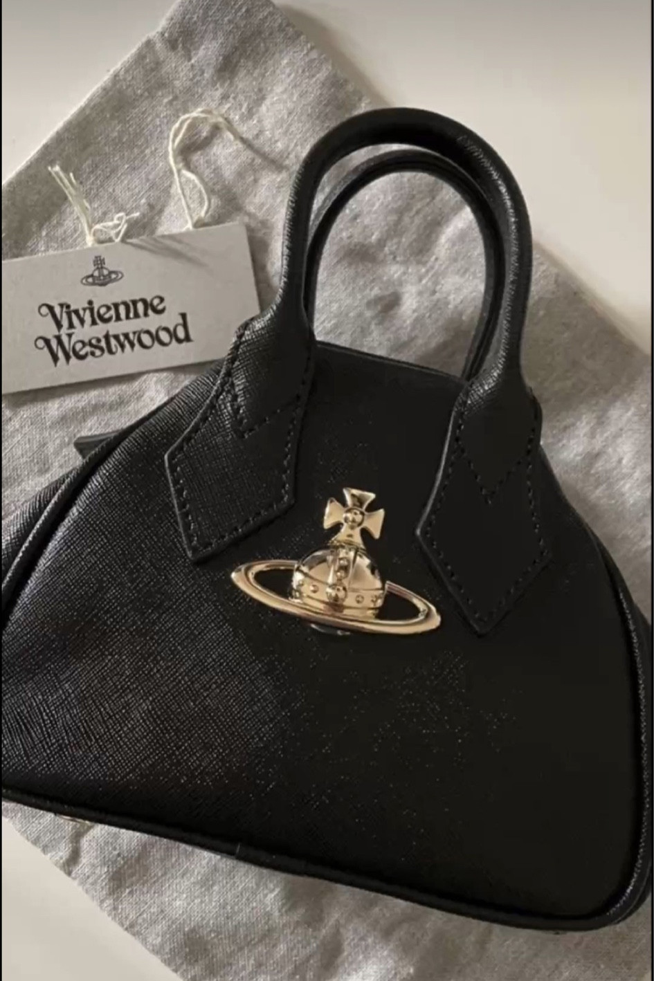 Vivienne Westwood black mini Yasmine bag. Under £250 at Farfetch. AW fashion, autumn, fall, designer bag.

Affordable fashion.  Wardrobe staple. Timeless. Gift guide idea for her. Luxury, elegant, clean aesthetic, chic look, feminine fashion, trendy look.

#LTKluxury #LTKbag #LTKautumn