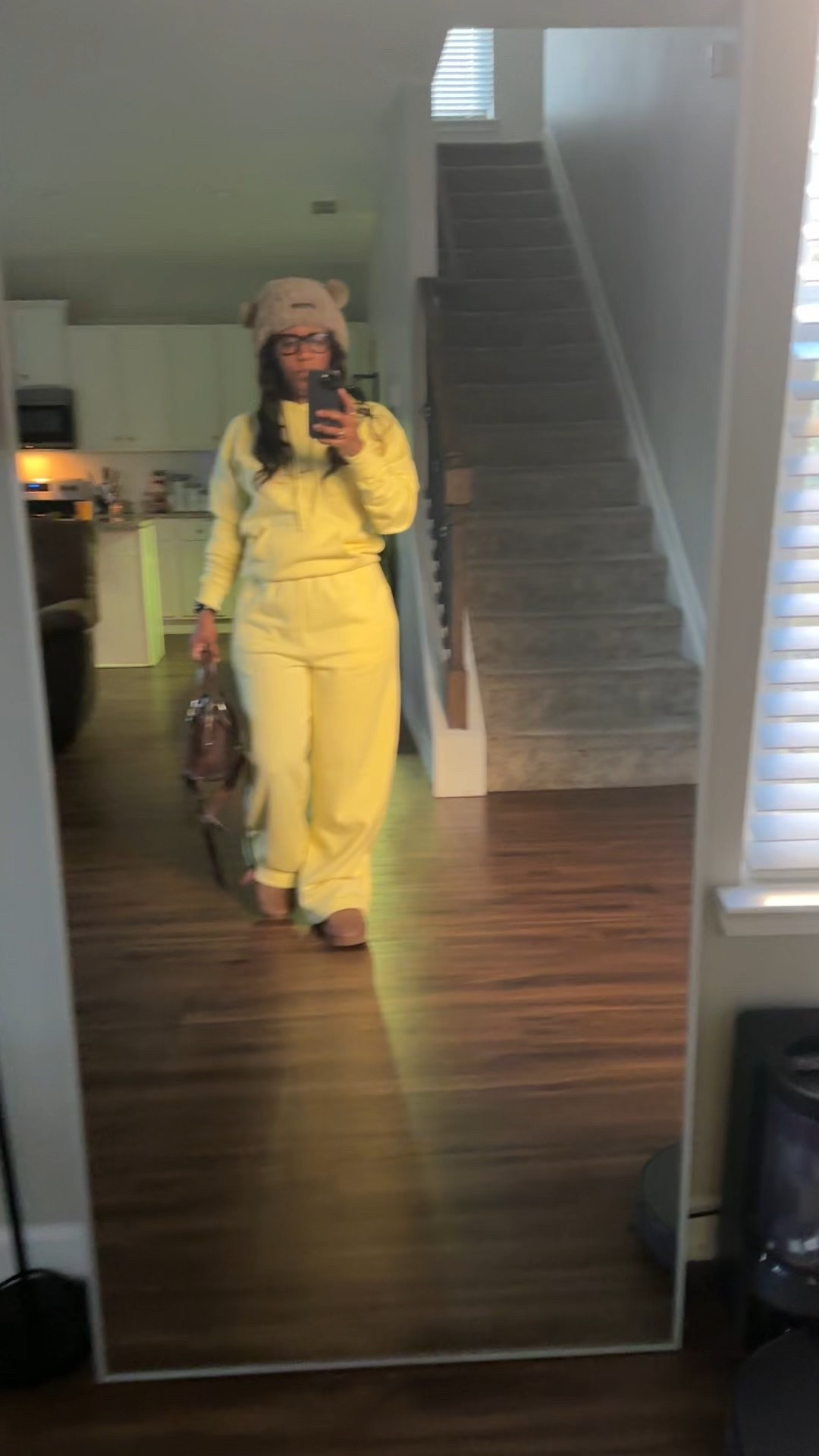 Yellow hoodie with matching wide leg sweatpants. I styled this matching set with a brown fluffy hat, brown purse, and brown boots

#LTKootd #LTKActive #LTKPetite