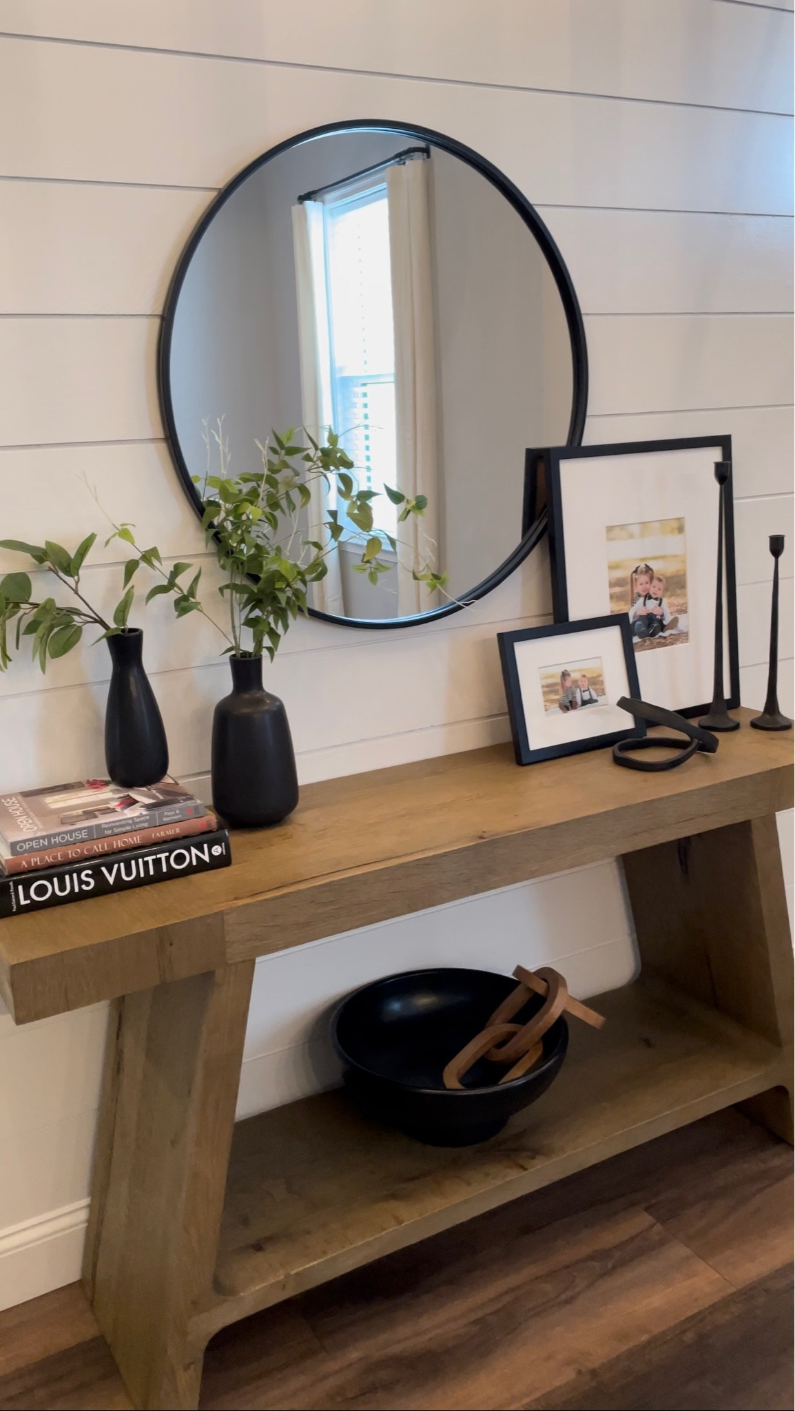 Shop my entryway!
- Table books 
- Vases
-Candlestick’s
- Frames 
- Round mirror
- Black decorative bowl  


#LTKhome #LTKunder100 #LTKunder50