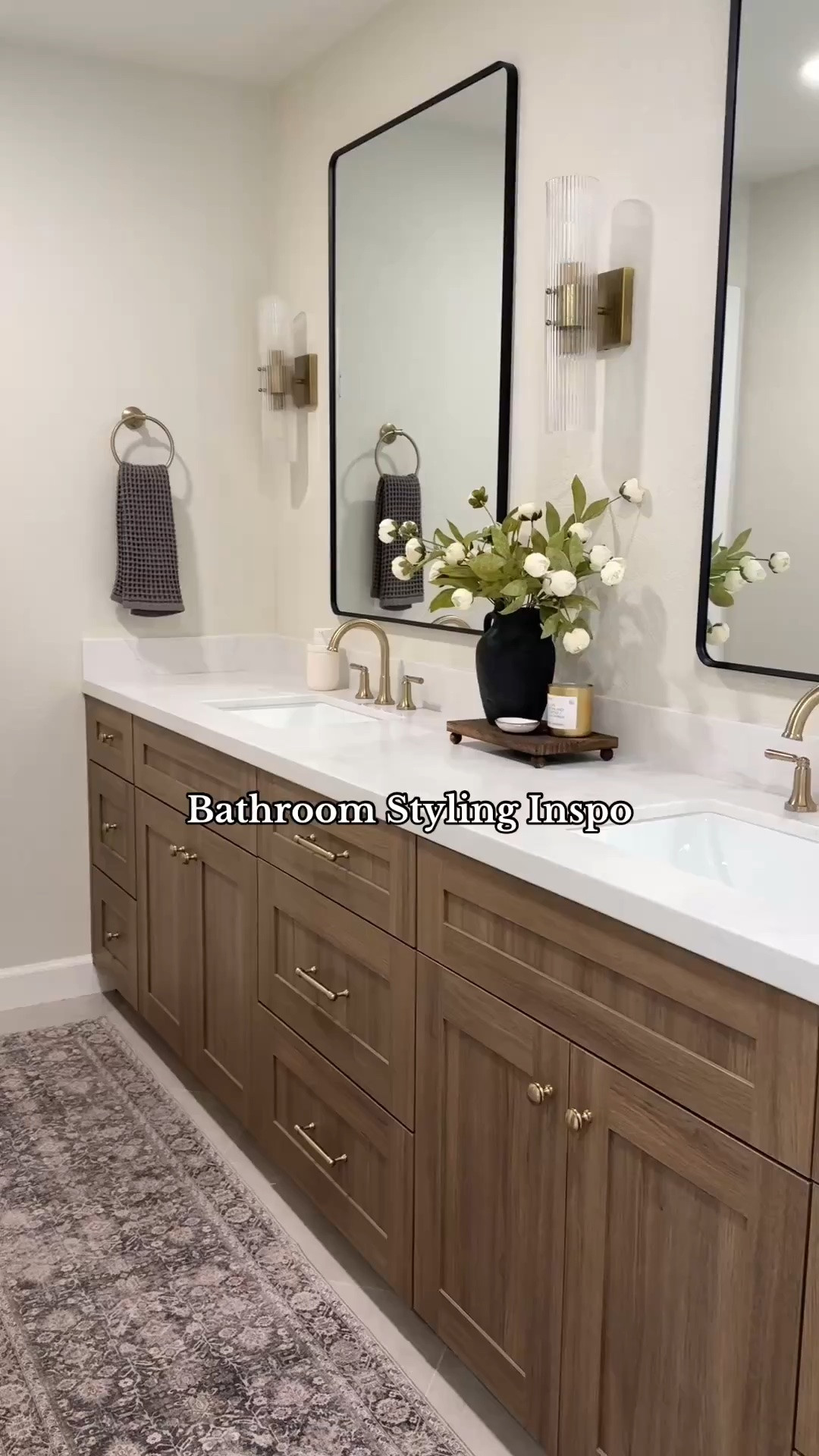 Inspo for styling a master bathroom! Bathroom decor should be minimal and timeless. The space needs to be functional so minimizing clutter is key! 
Bonus points if you have functional decor pieces like this Epsom salt jar!
•••
Bathroom decor, master bathroom decor, primary bathroom decor, bathroom counter styling, bathroom runner, runner rug, bathroom rug, bathroom stool, bathtub stool, bath salt jar, bathroom sconces, champagne bronze, delta champagne bronze

#LTKHome #LTKSaleAlert #LTKSeasonal