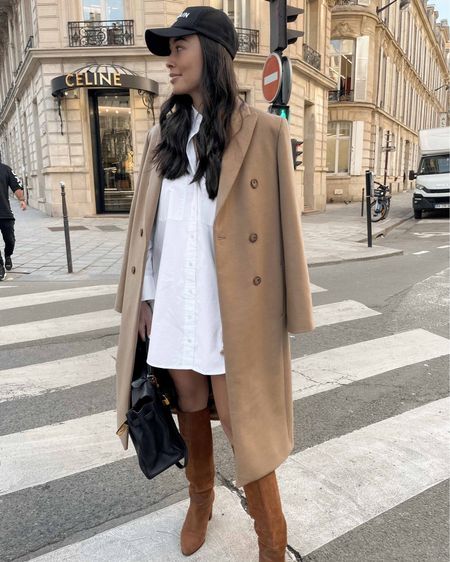 Kat Jamieson of With Love From Kat wears a fall outfit. Neutral coat, brown suede boots, white dress, black handbag, fall style, neutral outfit. 

#LTKSeasonal #LTKstyletip