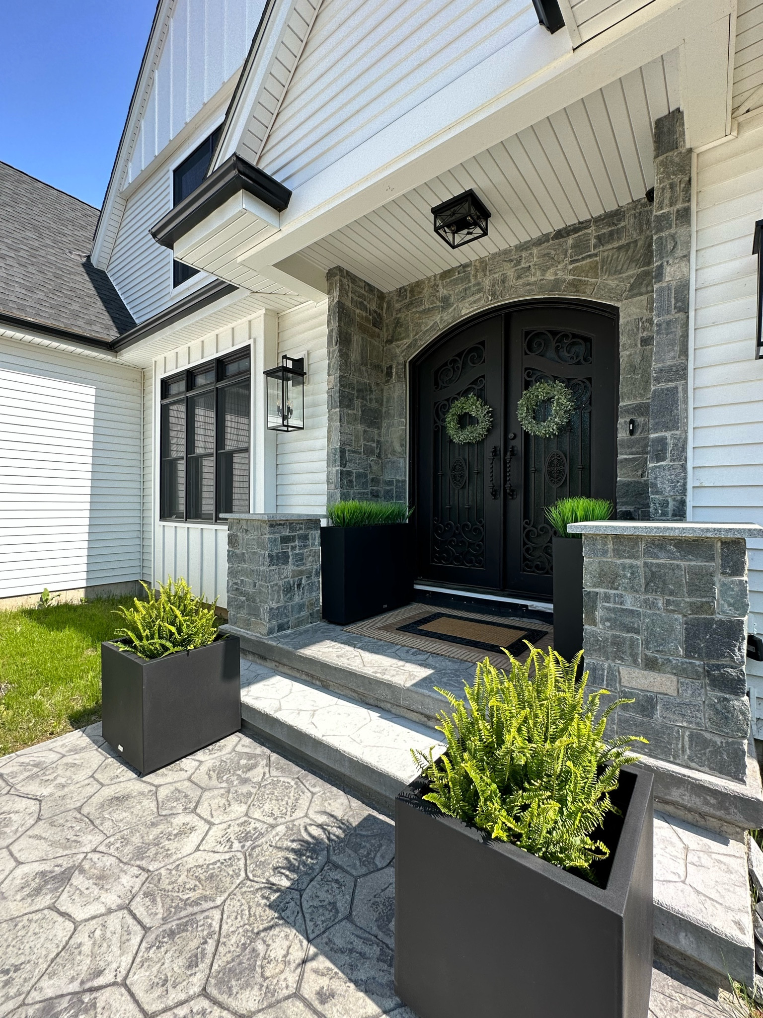 Front Entry Refresh

These block Veradek planters are the key to this modern feel front porch. They come in black or white in two different sizes. 

Front porch, spring refresh, summer refresh, patio, planter, flowers, greenery, faux flowers, faux stems, artificial grass, wreath, double door,

#LTKSeasonal #LTKhome #LTKFind