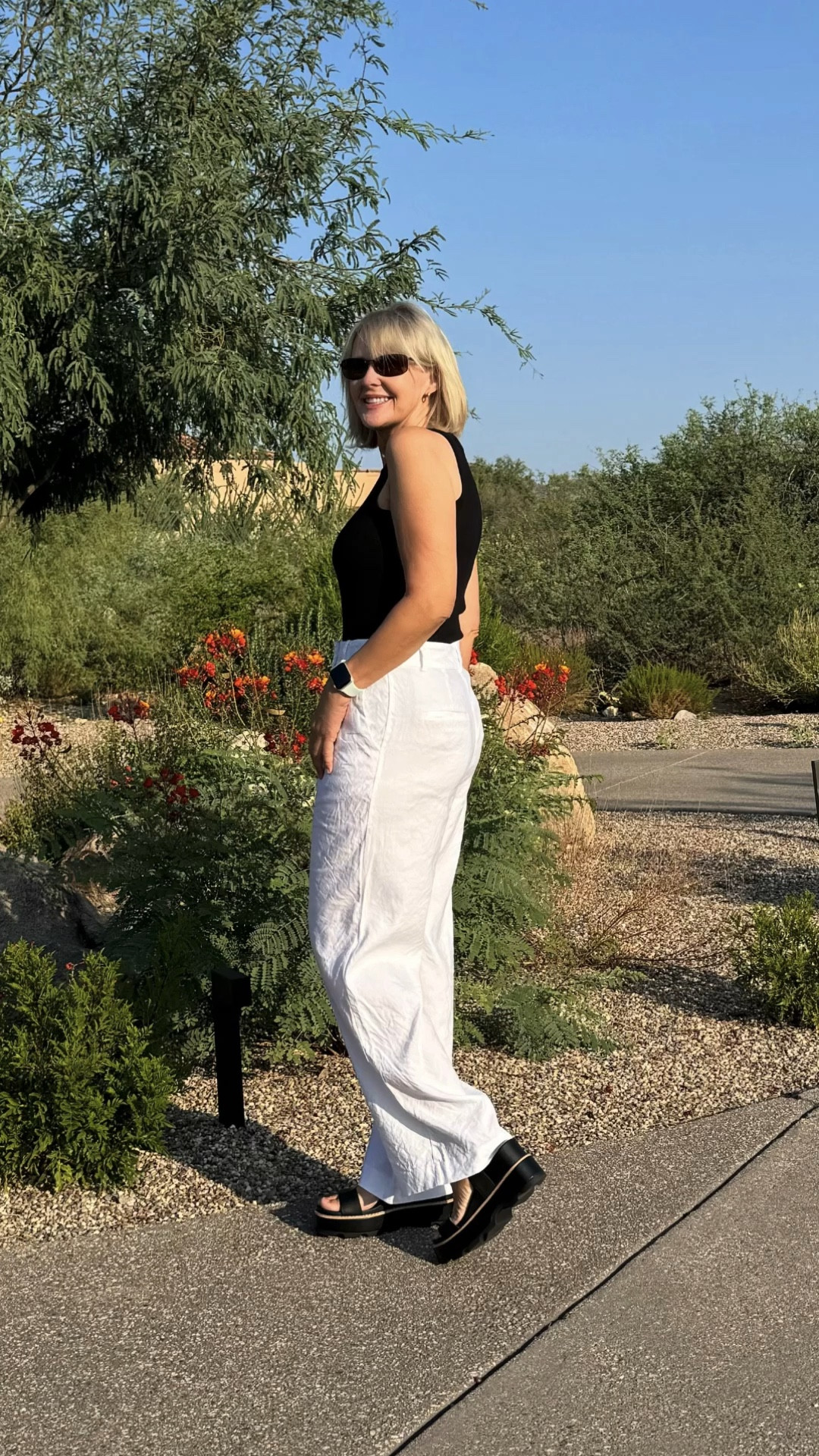 I love the simplicity and chicness of black and white. And I absolutely love these platform sandals! You’ll be seeing a lot of them on my page, lol. My Fanny pack is lightweight with a comfortable, adjustable strap. It has two zippered pockets and several mesh compartments, and is perfect for carrying your phone and other essentials.

#LTKShoeCrush #LTKOver40