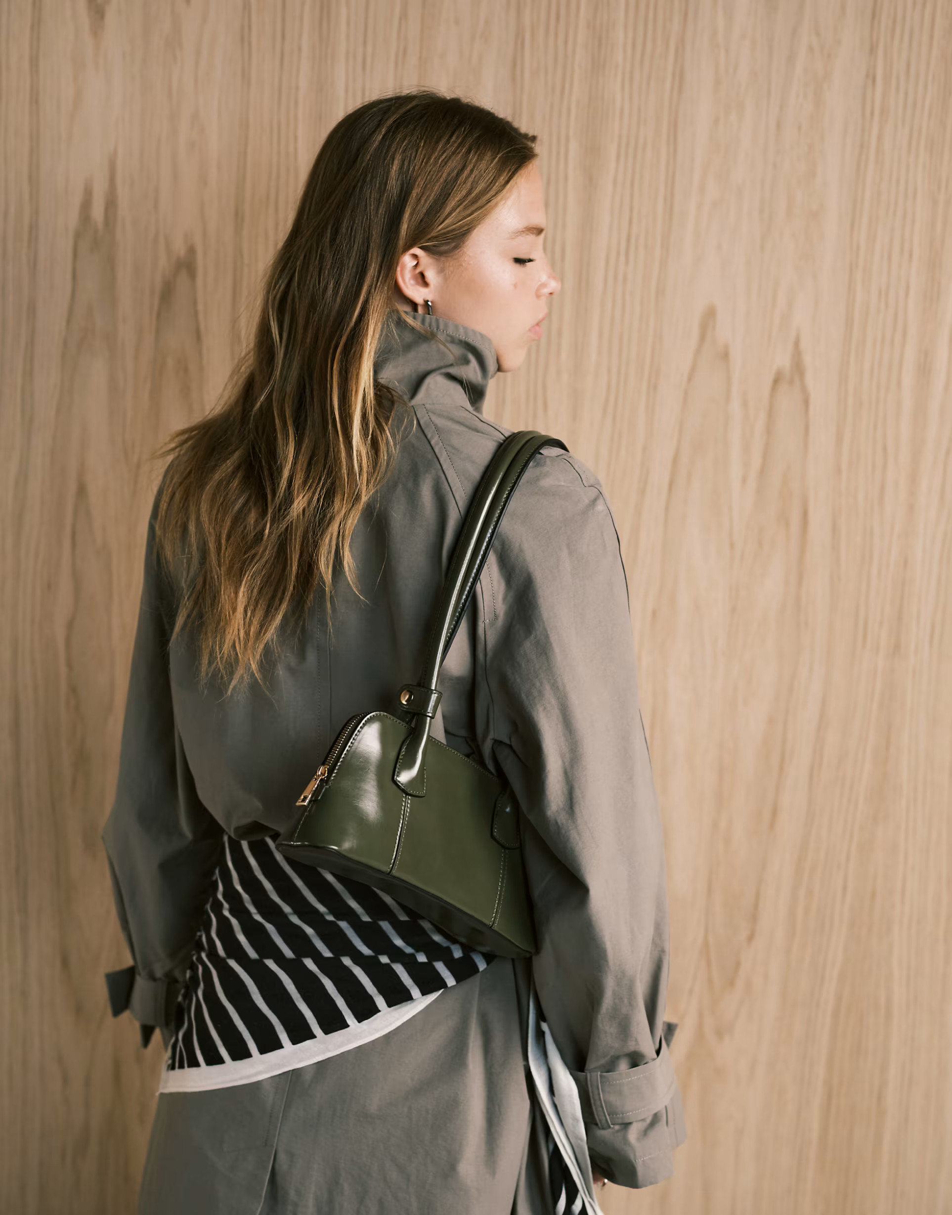 ASOS DESIGN elongated handle curved base bowler bag with seam details in olive | ASOS (Global)