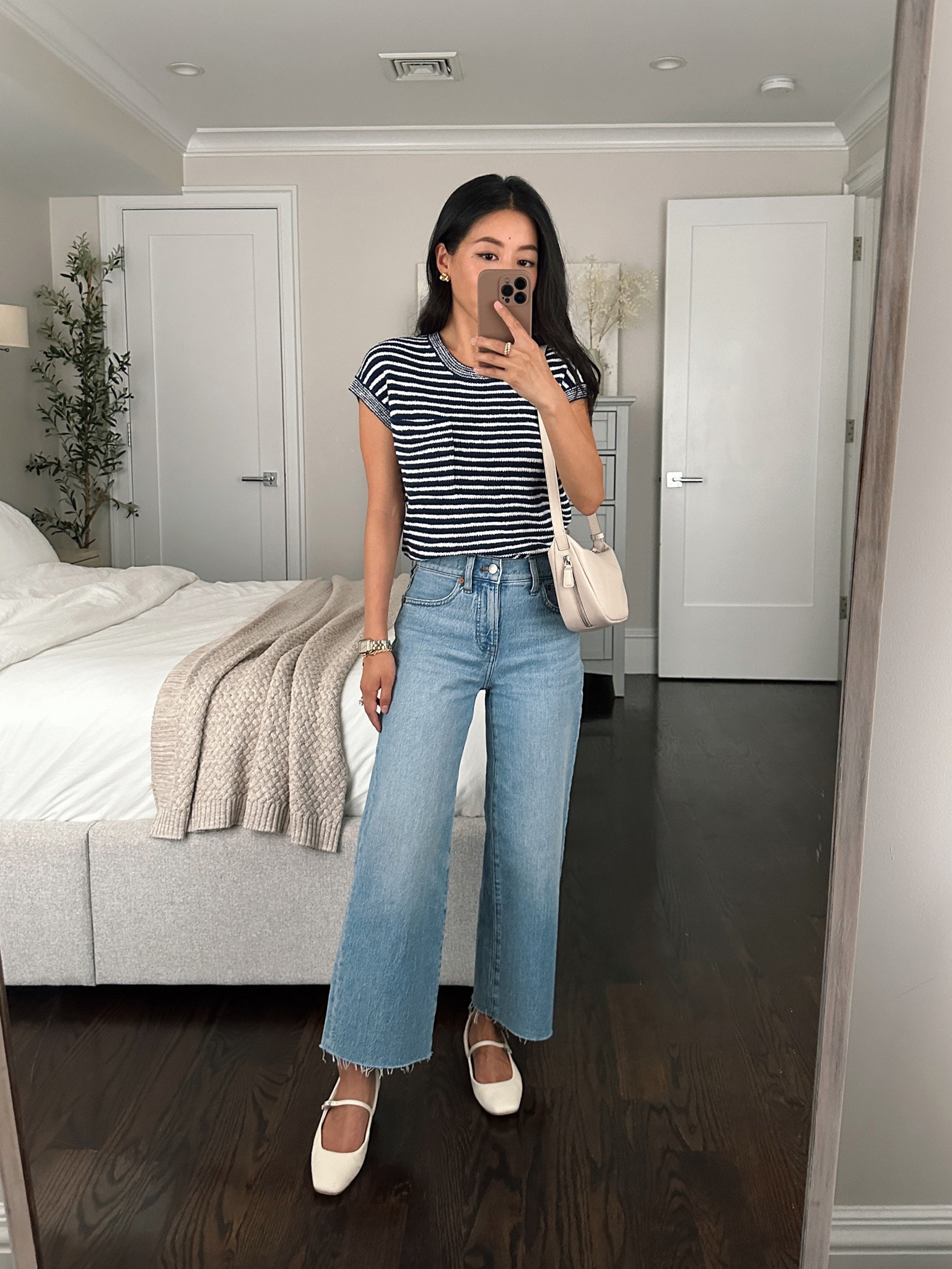 Also available in full length. These are the cropped version of the Madewell perfect vintage wide leg jeans that I own in several colors. 

Love that I can wear flats with the length of the petite sizing  @madewell #madewellpartner #ad #madewell

• Petite perfect vintage wide leg cropped jeans in Altoona wash 24P - some of my most flattering jeans! 24 petite measures 12.7” across waist, 9.5” rise, 24” inseam. The vintage canvas has a slightly higher rise in the same size. Great to style with flats, wedges, or a low heel. 

• Striped knit shirt xxs 

• Dolce vita flats 5.5, linked similar Madewell Mary Jane flat 

• Madewell crossbody bag

#LTKstyletip #LTKSeasonal #LTKworkwear